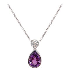 Pendentif chaton en or blanc 14 carats avec saphir rose lavande et diamants
