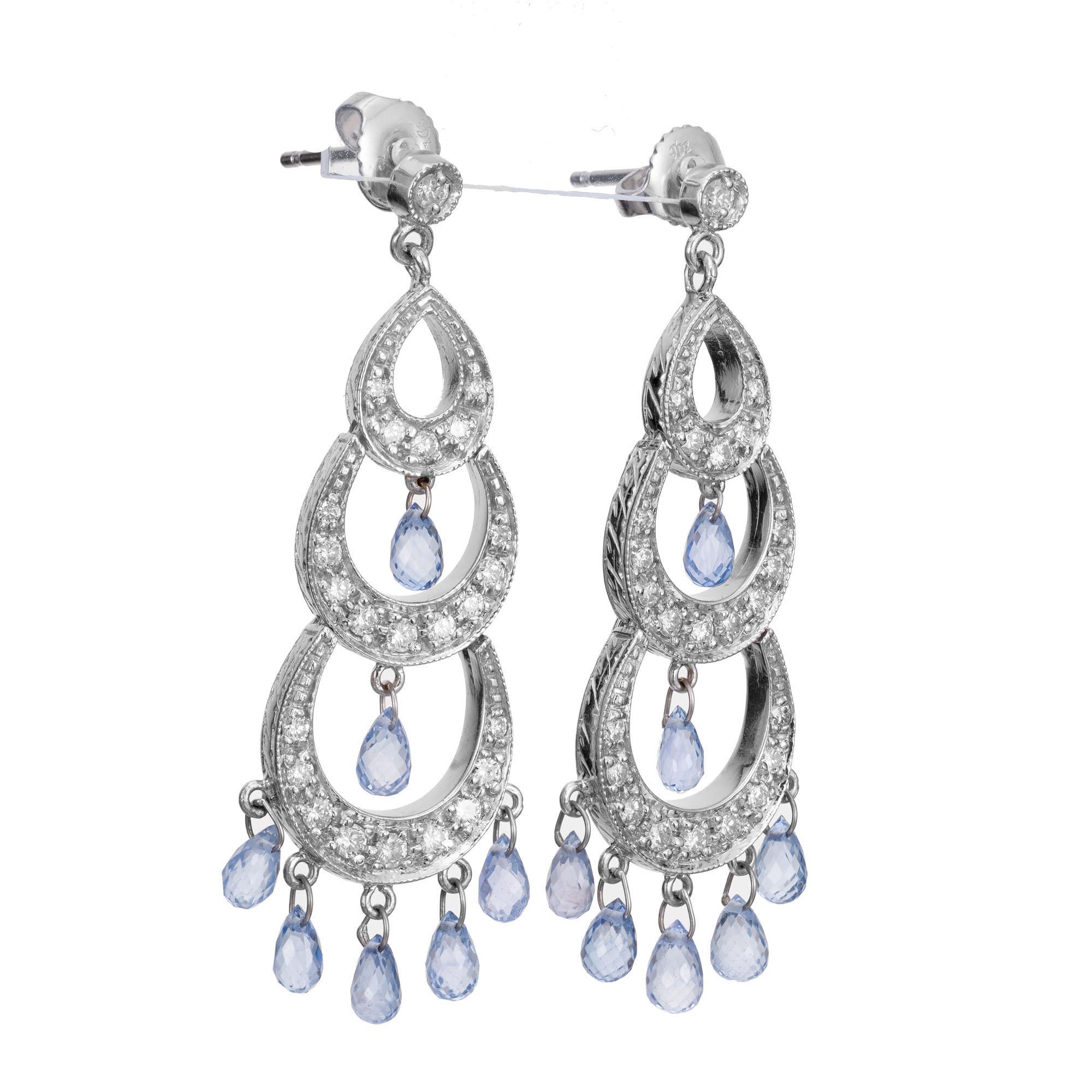 Elegant Lavender sapphire and diamond chandelier style earrings. 14 natural lavender briolette dangles accented with 44 full cut round diamonds set in 18k white gold.  

14 natural lavender sapphire briolette approx. total weight 7.00cts. 
44 full