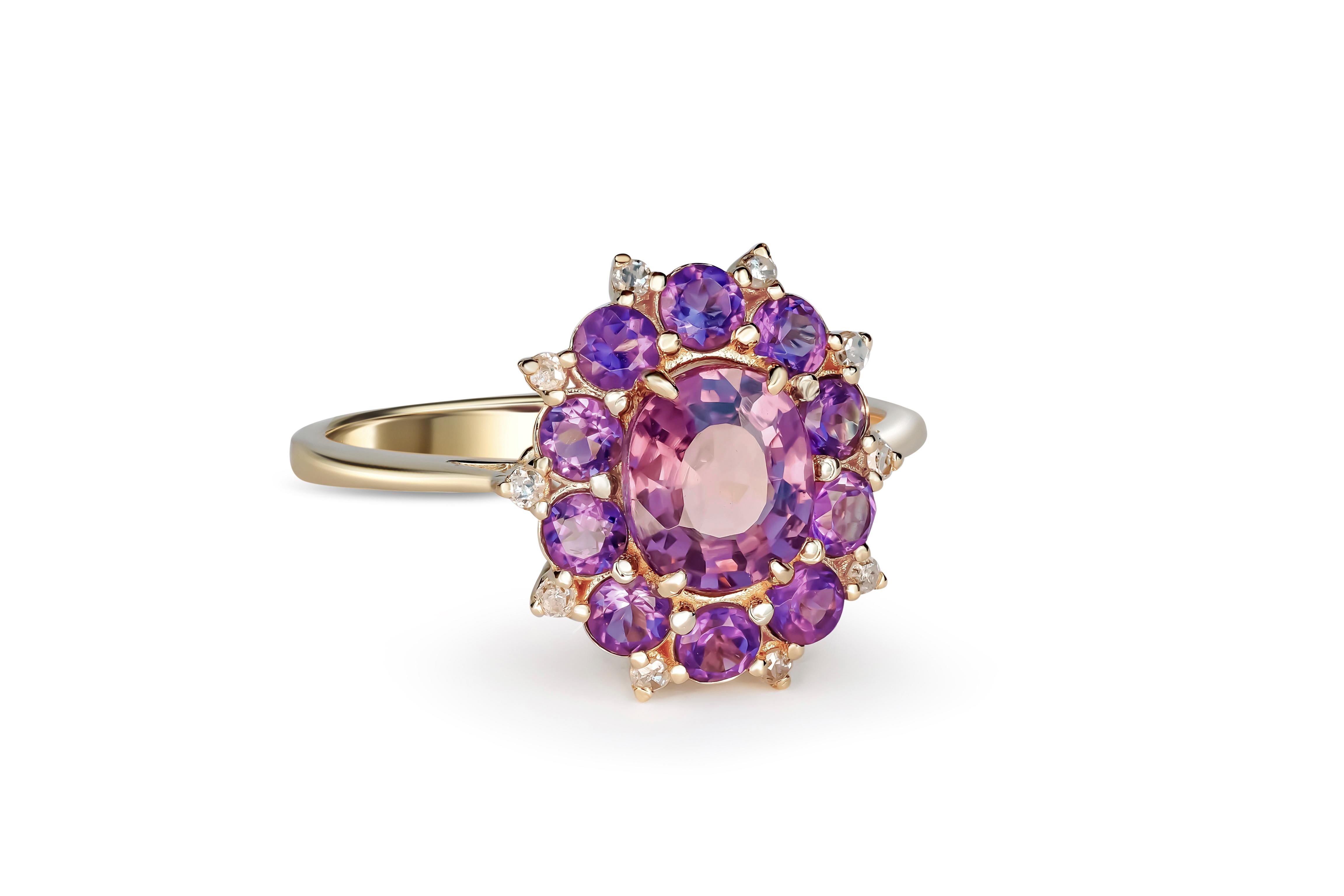 Lavender genuine spinel and side amethysts and diamonds 14 karat gold ring. August birthstone. February birthstone.
Total weight: 2.54 g.
Central stone: Genuine spinel
Weight - 1.60 ct.
Oval cut, color - lavender, Very Peri (Pantone color of the