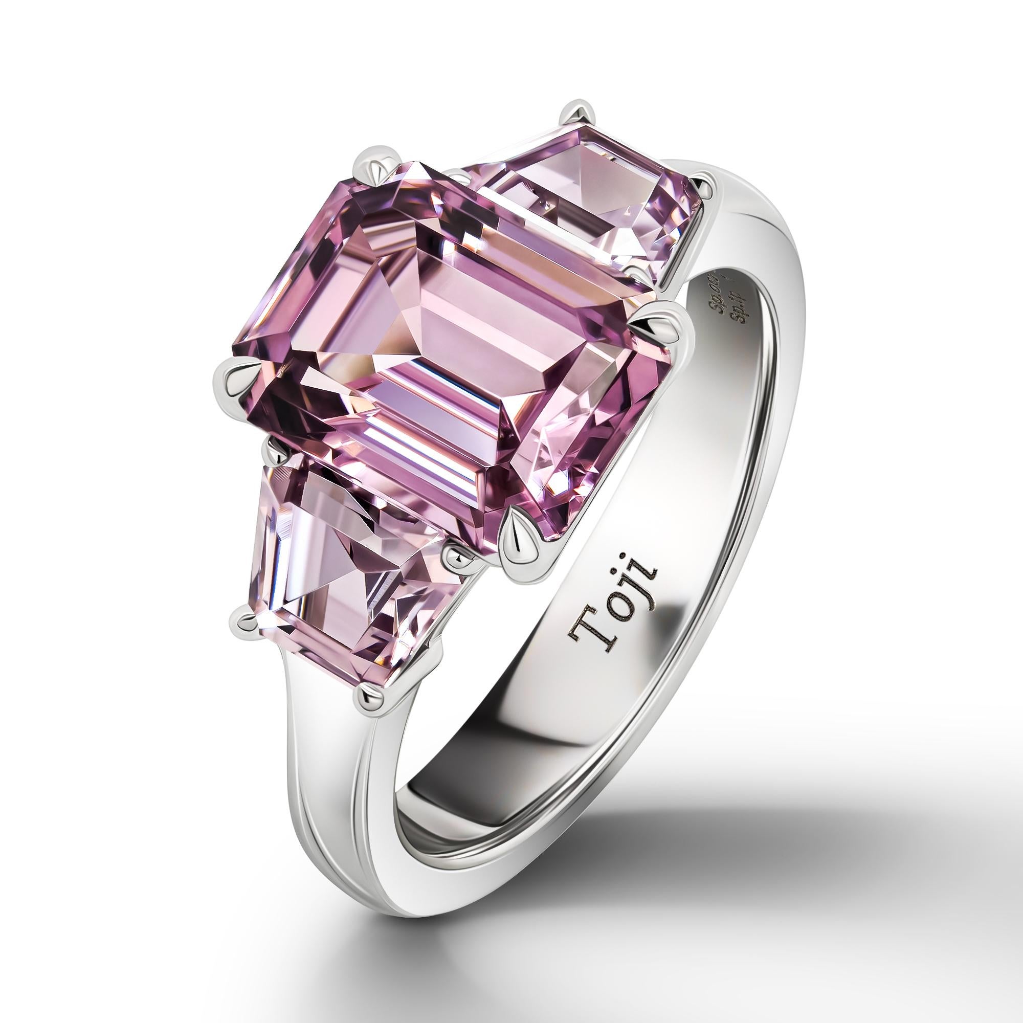 •	18k White Gold.
•	Lavender Spinels in emerald cut – total carat weight 3.27. 
•	Lavender Spinels in trapezium cut – 2 pc total carat weight 1.31.
•	Ring Size – 5.
•	Product weight –4.99 grams. 
