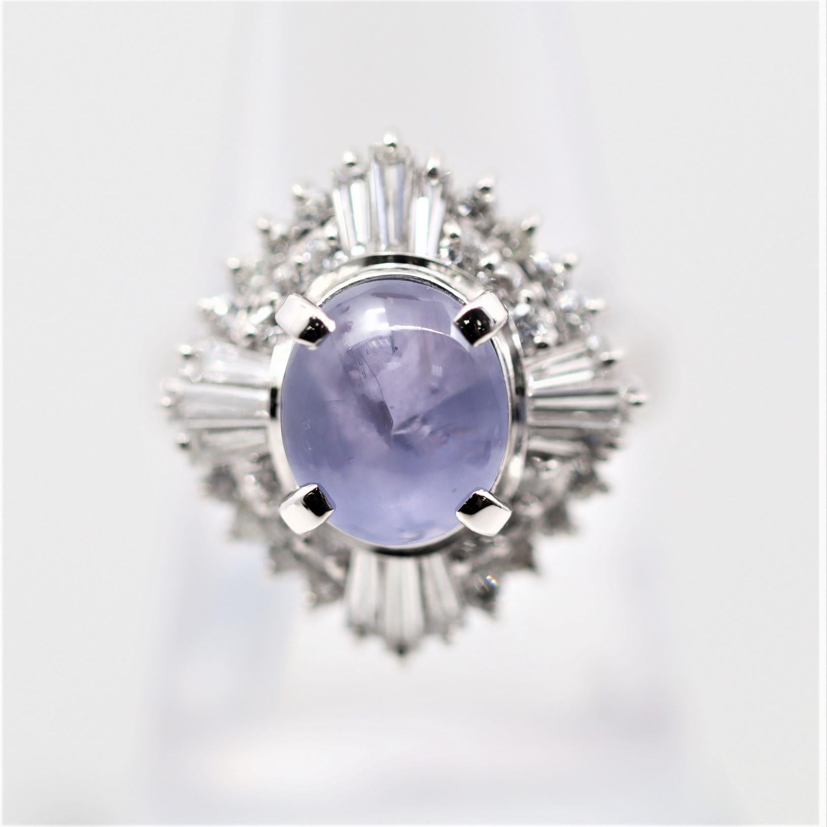 Be the star of your world! This lovely ring features a 5.33 carat star sapphire with a bright and pleasing lavender color. When a light shines on the top of the stone a 6 rayed star can be seen, known as asterism. It is complemented by 1.45 carats