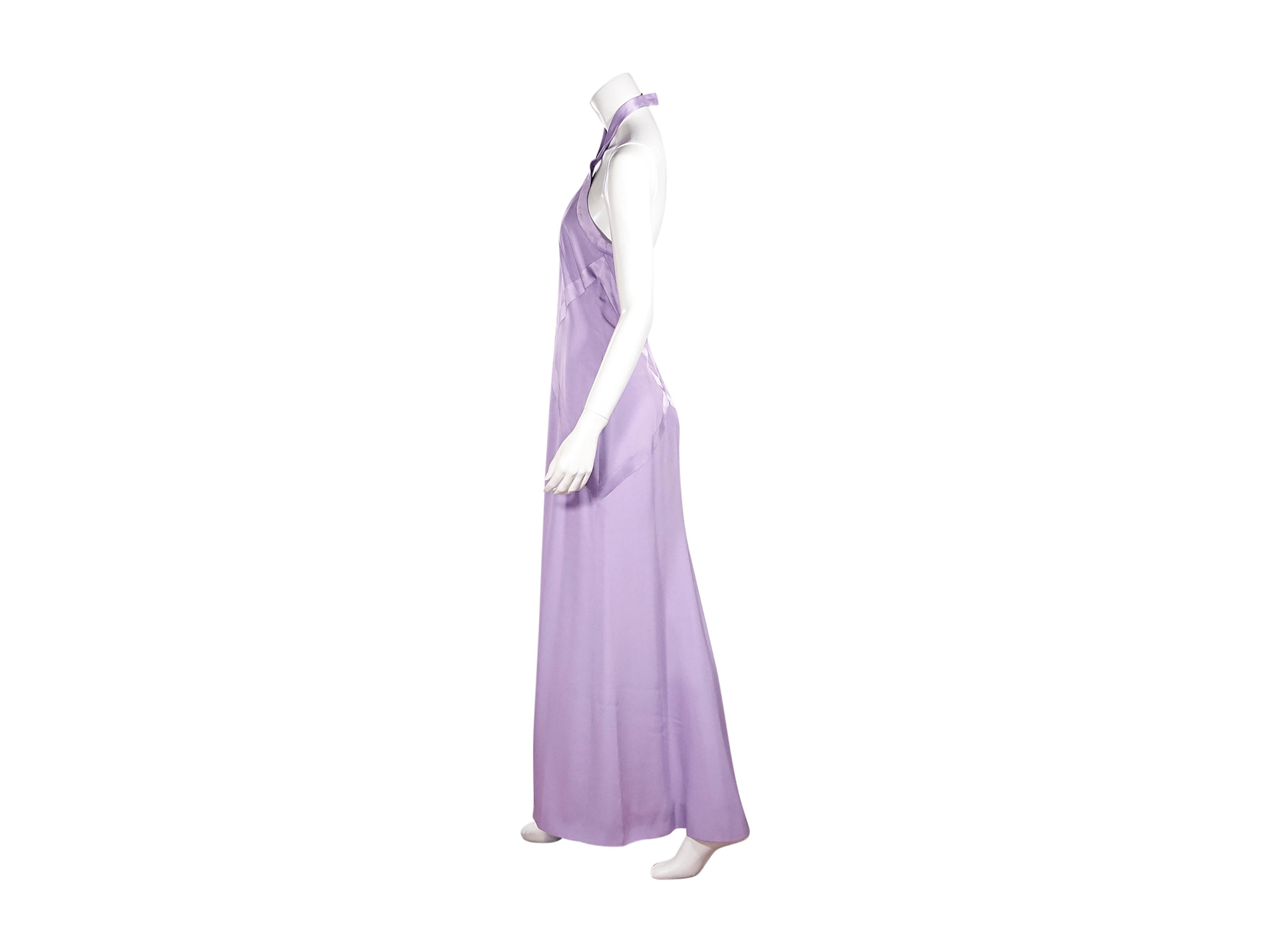 Product details:  Vintage lavender silk gown by Givenchy Couture.  Circa the late 1990s.  Halterneck.  Concealed back zip closure.  Label size FR 40.  34