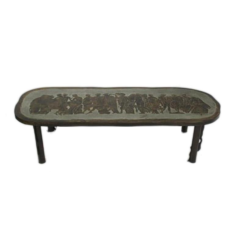 Phillip and Kelvin LaVerne bronze and pewter rectangular top coffee table with rounded edges, etched decoration of Roman figures, signature on lower right corner of table and original patina.

Measurements:
Height: 15