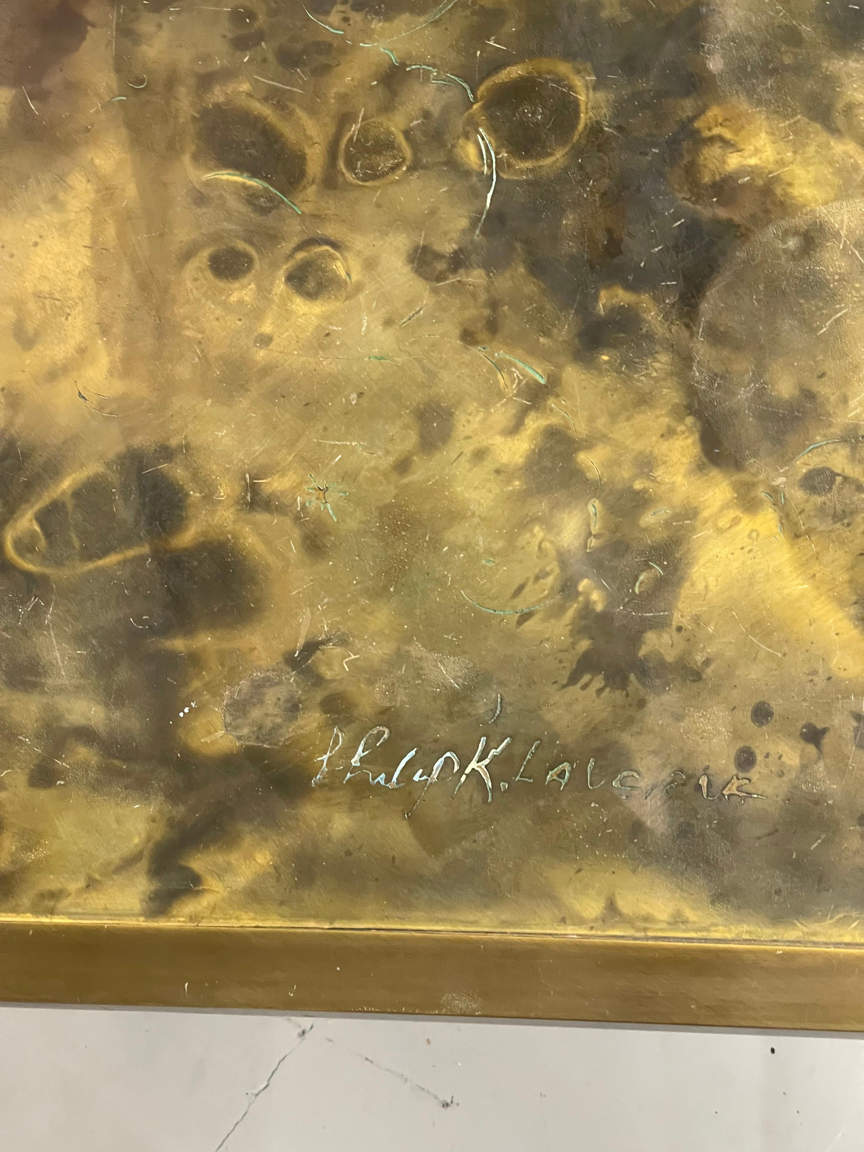 A classical table in bronze from the Philip Laverne Collection from the 1960's. It has two partial paper labels on the bottom and is signed Philip K. Laverne on the top. The top of this table has some wear to the surface, cloud splotches, and ring