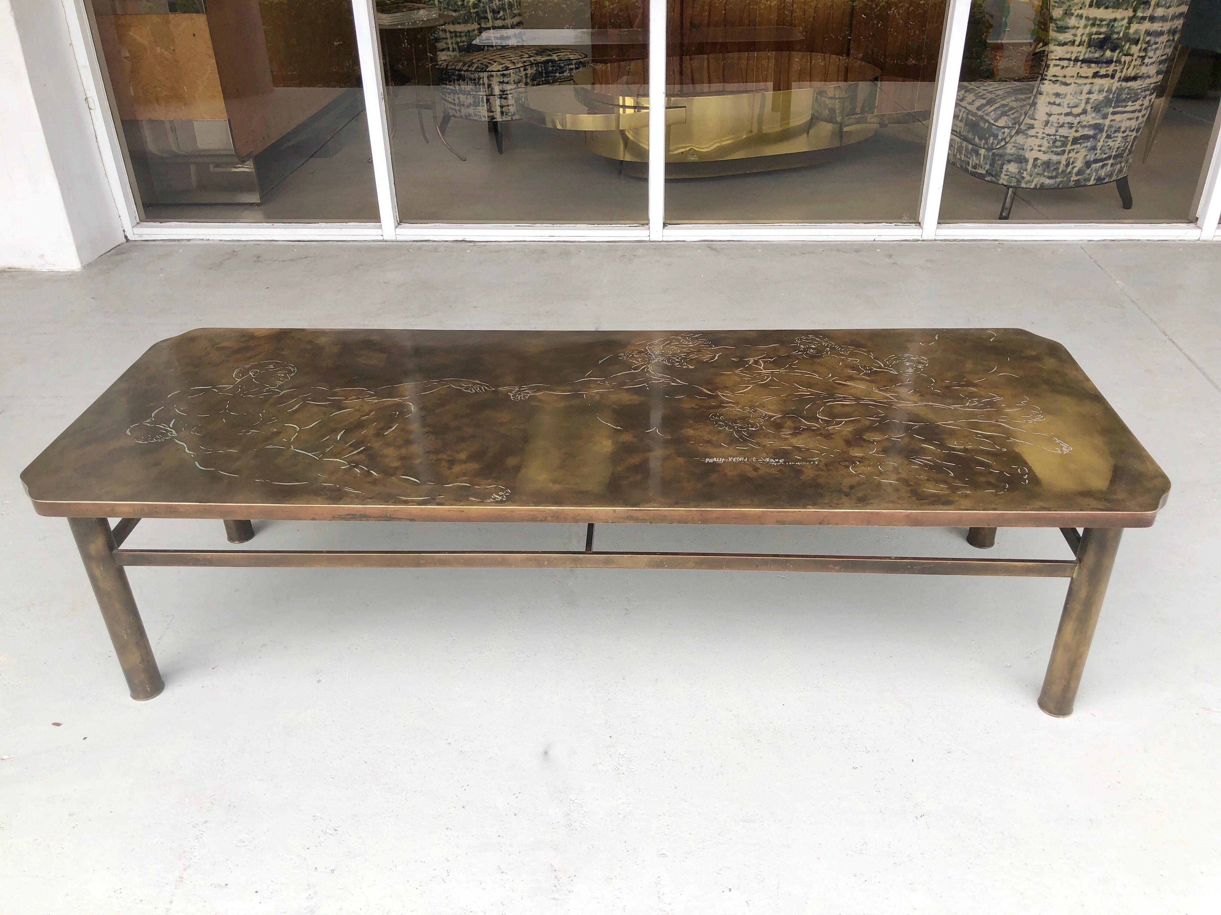 A bronze coffee table by Phillip and Kelvin Laverne. It has etched on the top the Creation of man after Michelangelo's masterpiece.