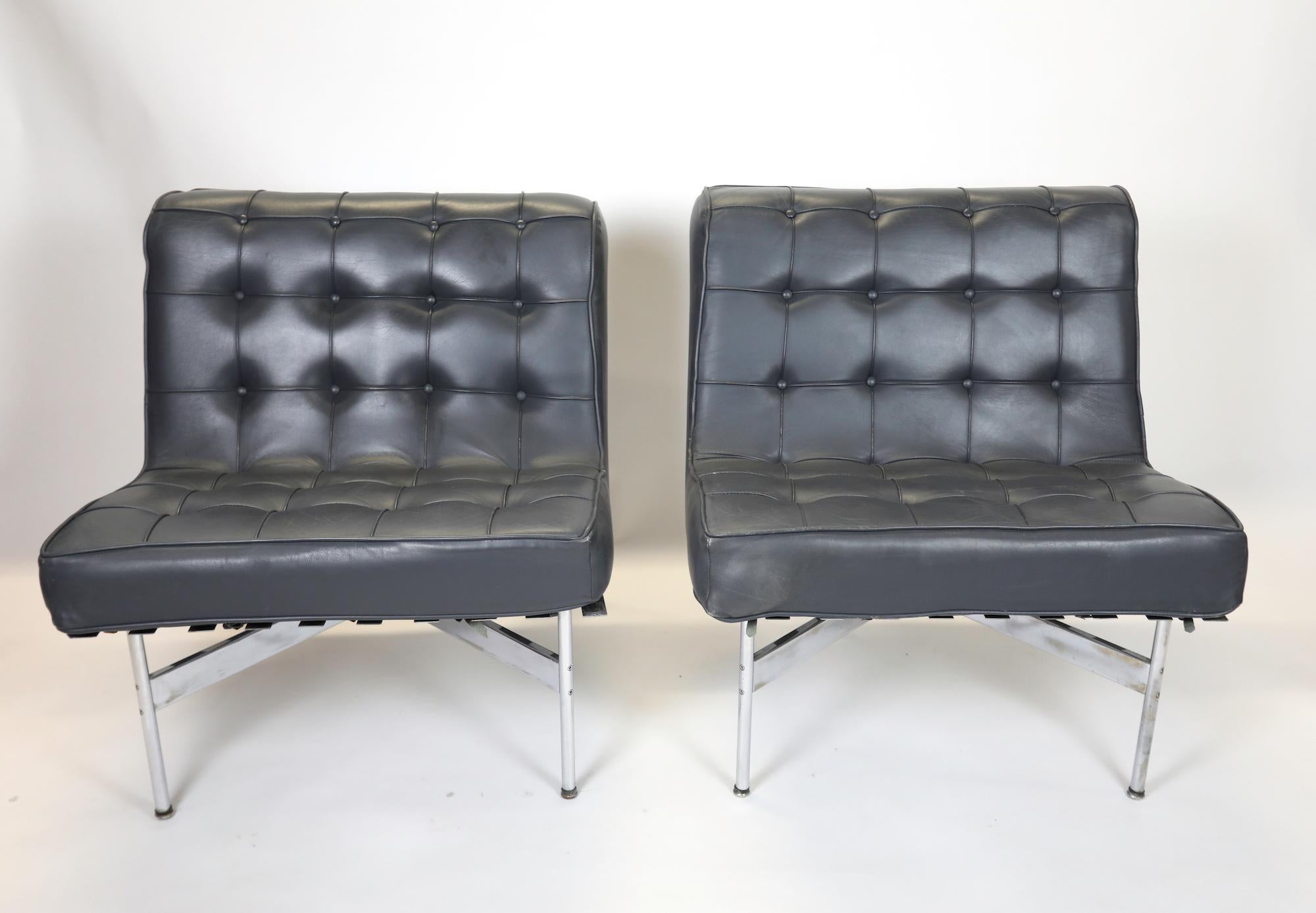 A pair of Laverne lounge chairs designed by Ross Littell C.1952.
Original leather cushions and chrome plated frame.