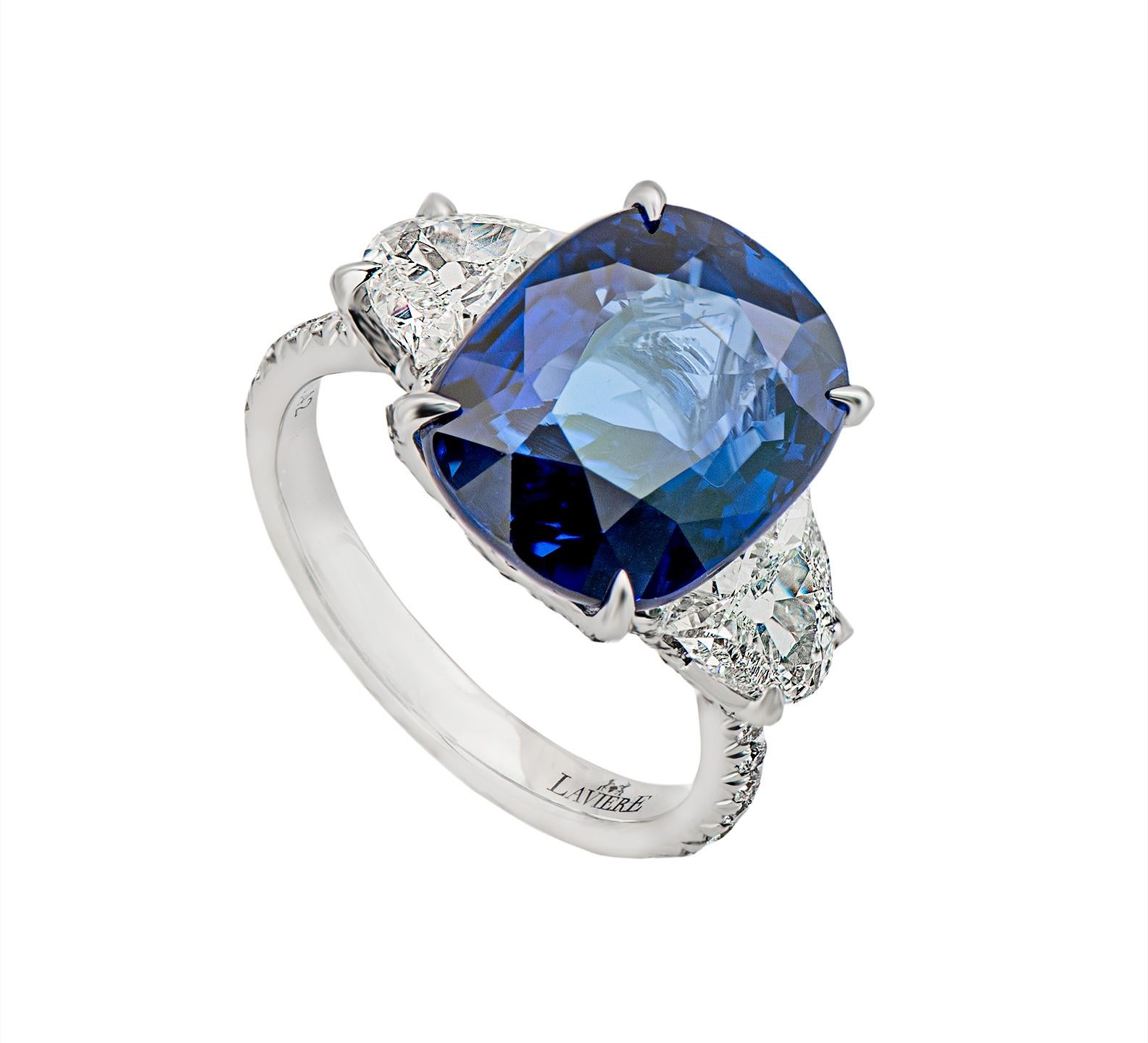 18 karat white gold blue sapphire cocktail ring from the Azure collection of Laviere. The ring is set with a  8.2 carats blue sapphire and 0.42 carats taper cut diamonds. 
Gold Weight 5.83 grams. Diamond Clarity VS-SI. Diamond Colour H-I.
The ring