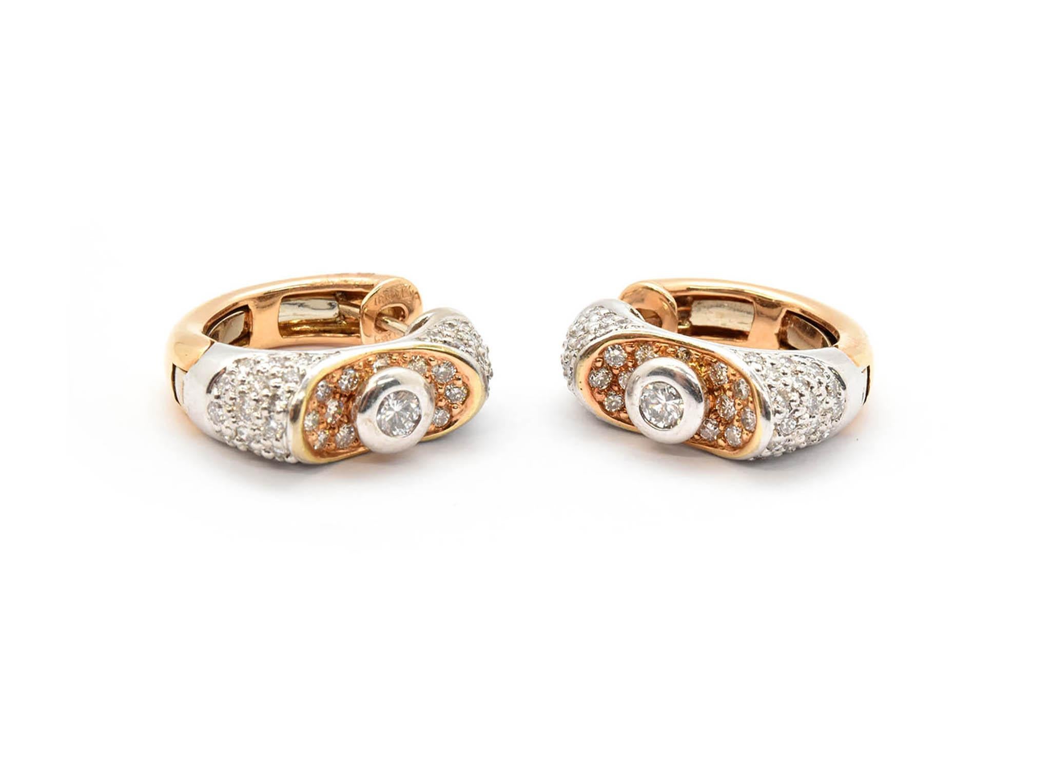 Designer: Lavin
Material: 18k white and rose gold
Center Diamonds: 2 round brilliant cut = .30cttw
Color: G-H
Clarity: VS-SI
Center Diamonds:  round brilliant cut = .90cttw
Color: G-H
Clarity: VS-SI
Dimensions: earrings are approximately 20mm in