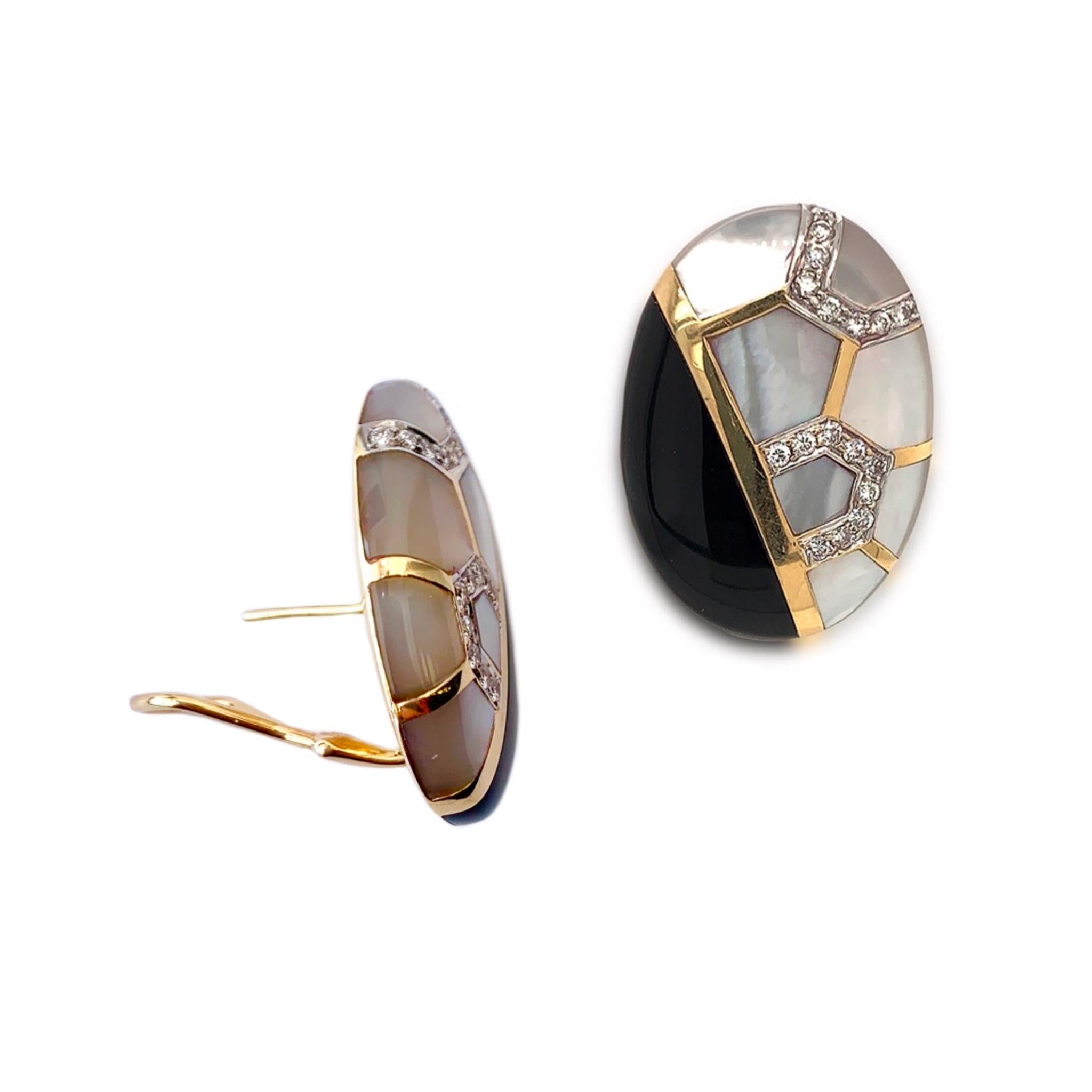 Vintage designer Lavin 14KT yellow and white gold, black onyx, mother of pearl and white diamond earrings, circa 1980's. The bold geometric design contains inlaid black onyx, lustrous mother of pearl and 36 brilliant cut diamonds with a total weight