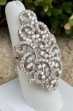 Lavish Large 9.5 Carat Diamond Swirling Motif 18 Karat White Gold Cocktail Ring