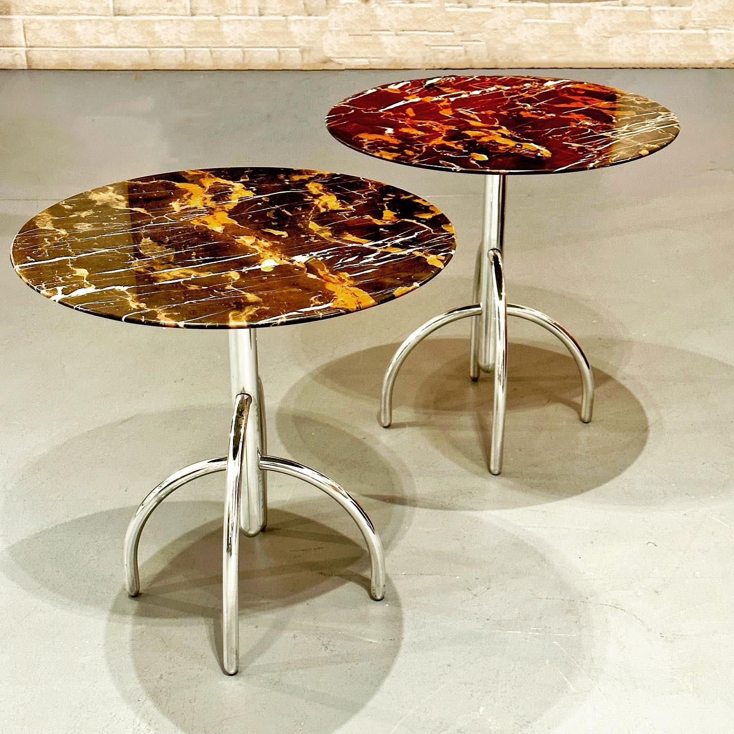 Lawrence Laske for Knoll Pair Saguaro Cactus Marble and Polished Aluminum Side Tables, ca 1993

This stunning pair of side table featured a polished aluminum base and gorgeous tops made of Port Laurent marble. This marble has a deep brown \to almost