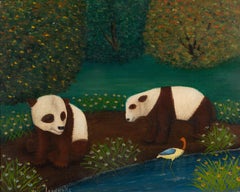 Dos pandas junto al agua