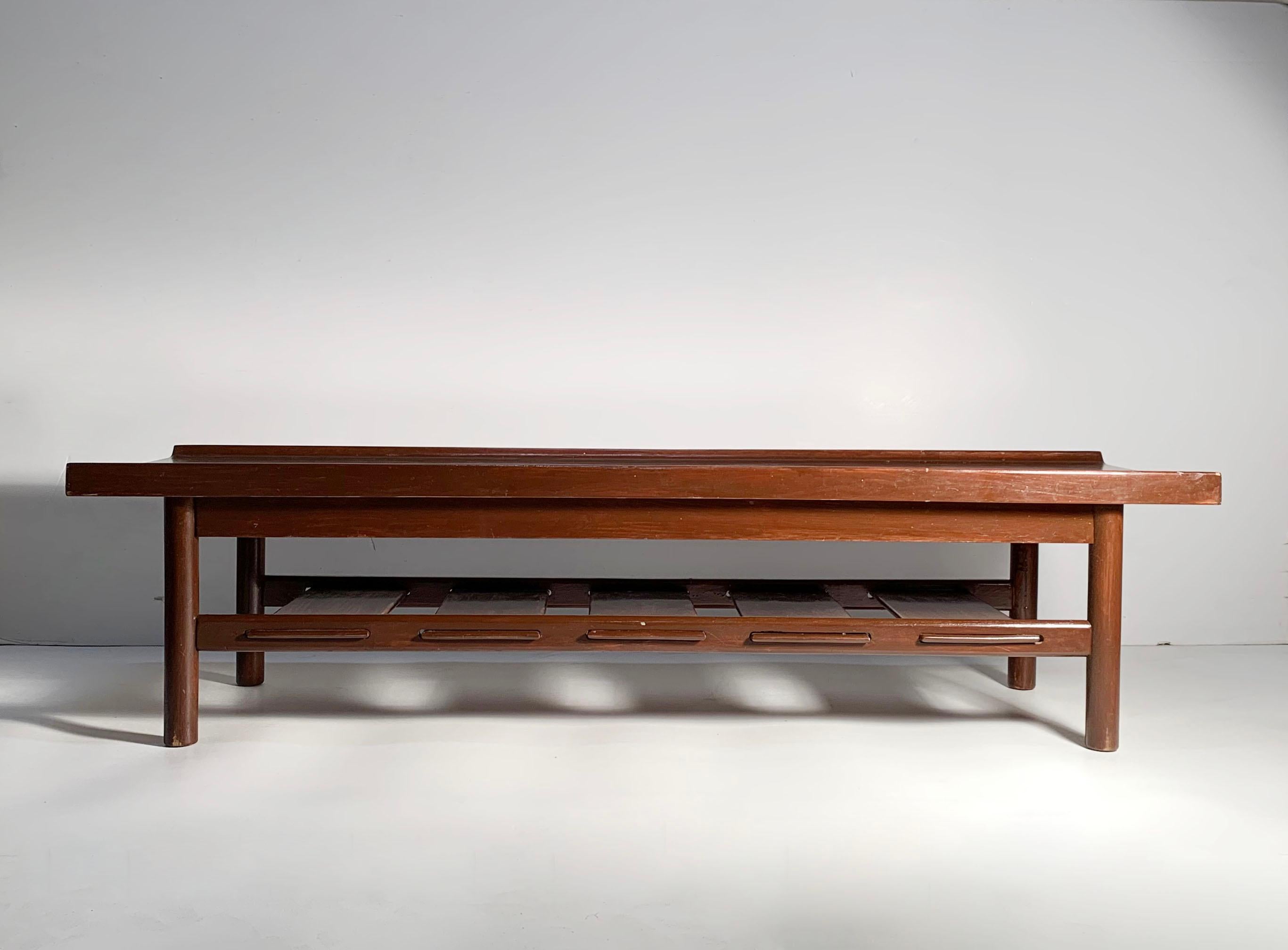 Lawrence Peabody Long Walnut Bench / Coffee Table For Richardson-Nemschoff. This bench should be purchased with the intent to completely refinish and possibly lacquer a color. Looks like someone painted this bench brown at one time. A fair amount of