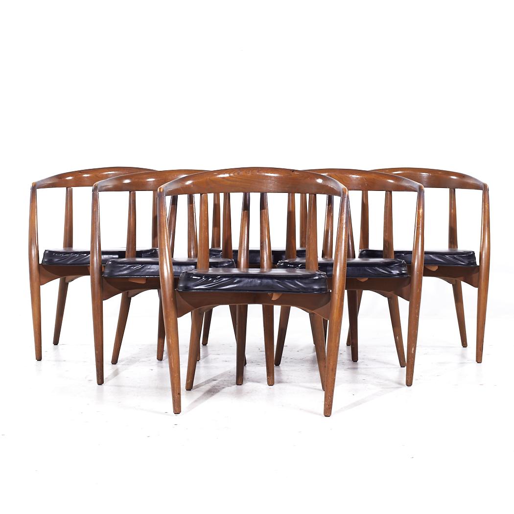 Lawrence Peabody Mid Century Walnut Arm Chairs - Set of 6

Each chair measures: 22.5 wide x 21 deep x 30 inches high, with a seat height of 18 and arm height/chair clearance of 28 inches

All pieces of furniture can be had in what we call restored