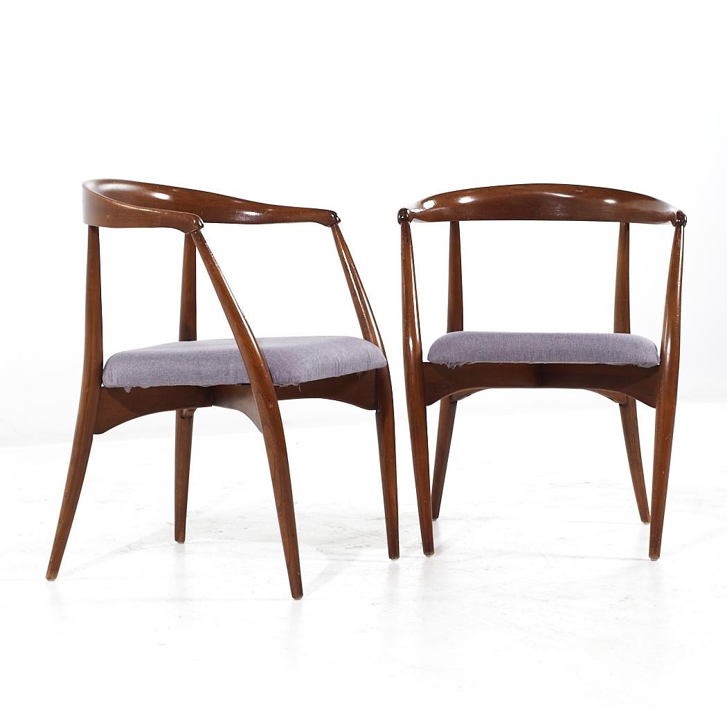 Lawrence Peabody Mid Century Walnut Dining Chair - Pair

Each chair measures: 23.25 wide x 21 deep x 29.75 inches high, with a seat height of 17.5 and arm height/chair clearance of 27.25 inches

All pieces of furniture can be had in what we call