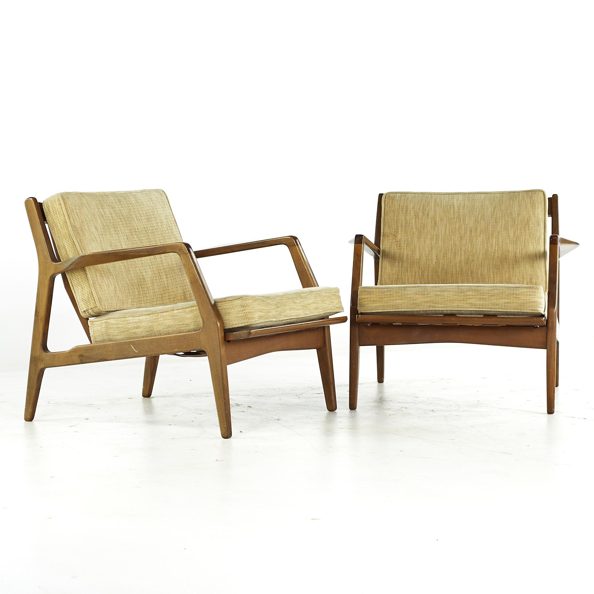 Lawrence Peabody midcentury Walnut Lounge Chairs - Pair

Each chair measures: 30.5 wide x 32 deep x 27 high, with a seat height of 16 and arm height/chair clearance 21.75 inches

All pieces of furniture can be had in what we call restored