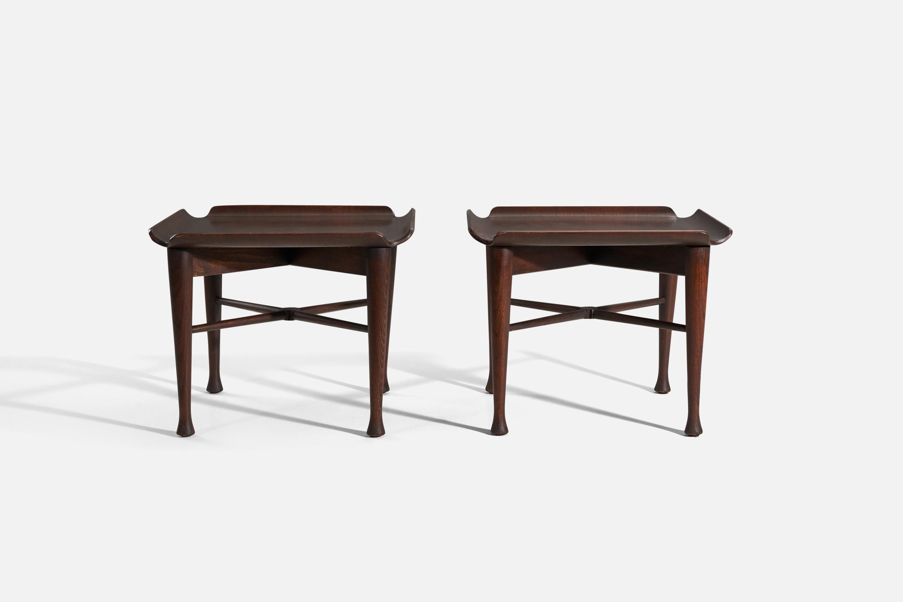 A pair of solid walnut and molded walnut plywood side tables/end tables, designed by Lawrence Peabody and produced by Richardson Nemschoff, United States, 1960s.
   