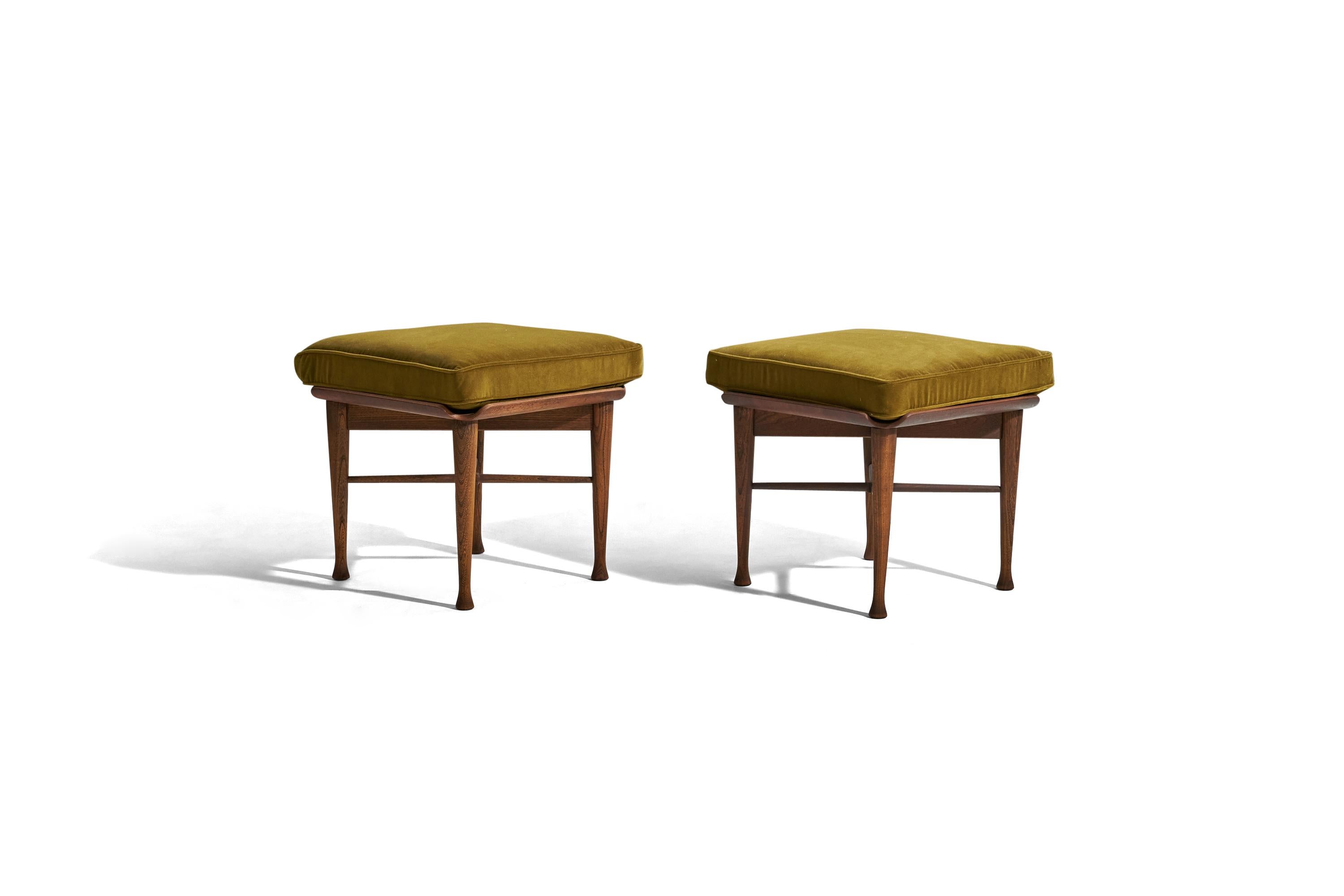 A pair of solid walnut and molded walnut, plywood and fabric stools, designed by Lawrence Peabody for Richardson Nemschoff, United States, 1960s.
 