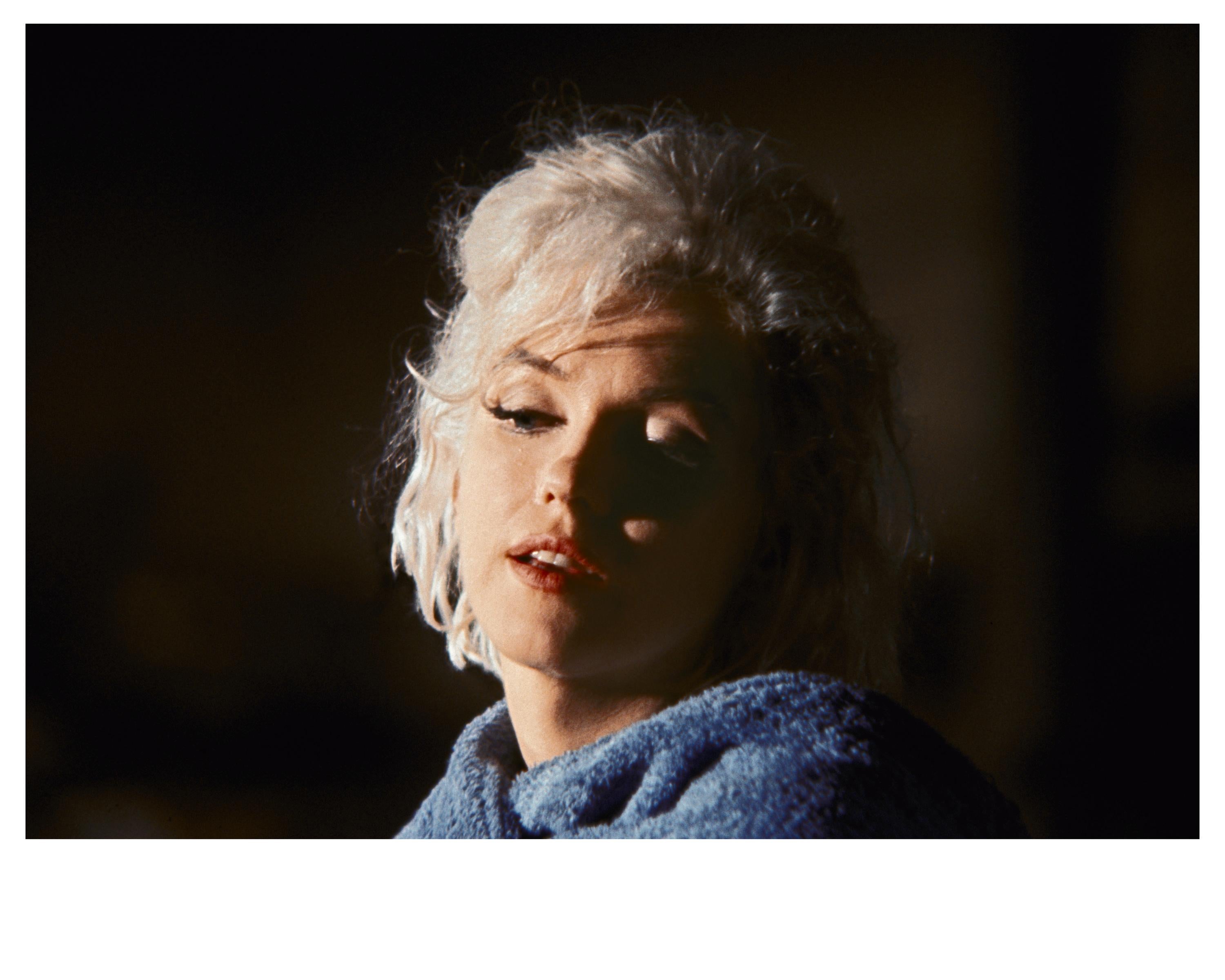 'Marilyn Monroe, 1962' by American photographer, Lawrence Schiller. Archival digital pigment, Ed. 9/25. Image: 13.25 x 19 in. / Paper: 16 x 20 in. From the set of the film 'Something's Got to Give', this colored photograph features a closeup of