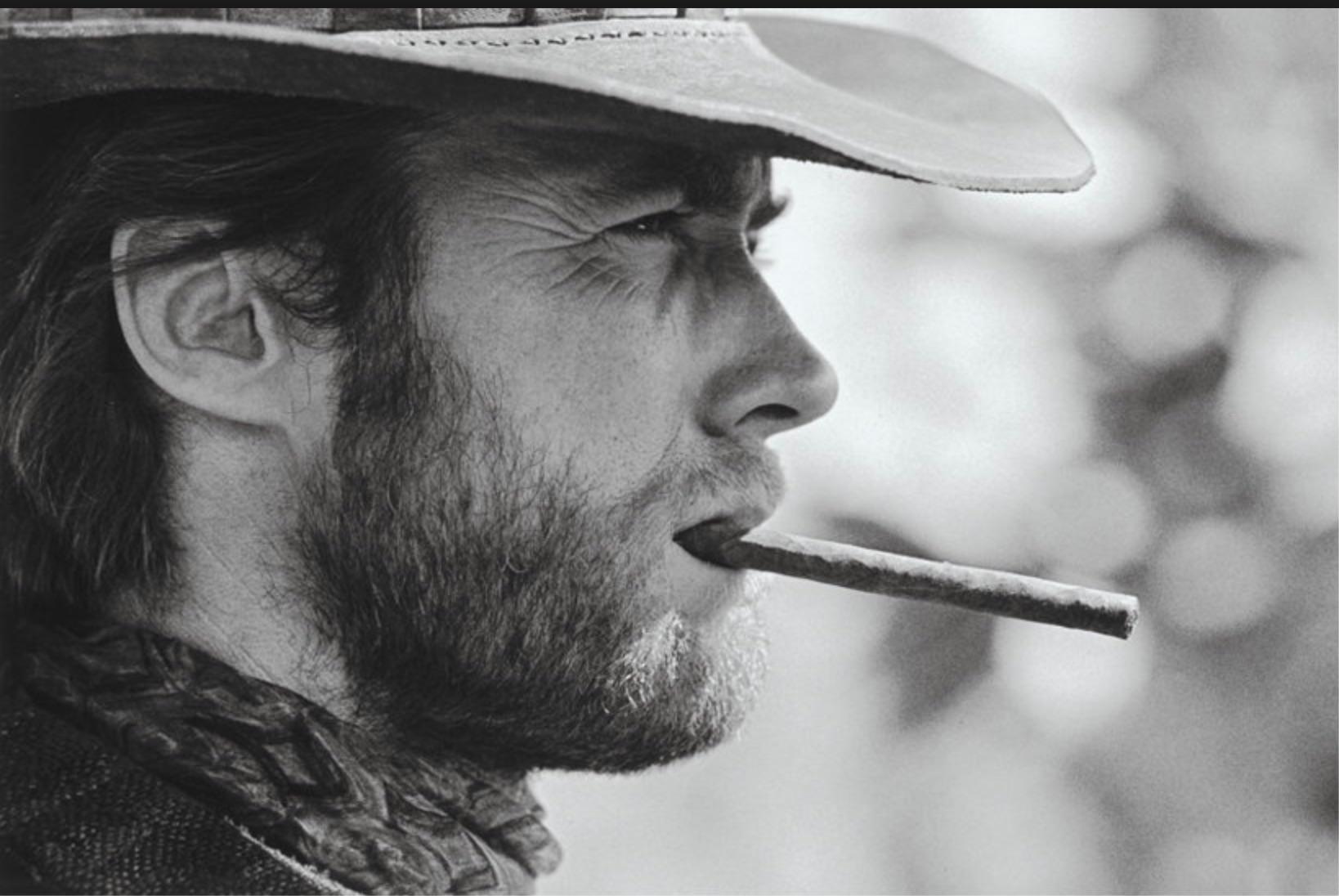 Lawrence Schiller Black and White Photograph - Clint Eastwood with Cigar, Durango, Mexico 