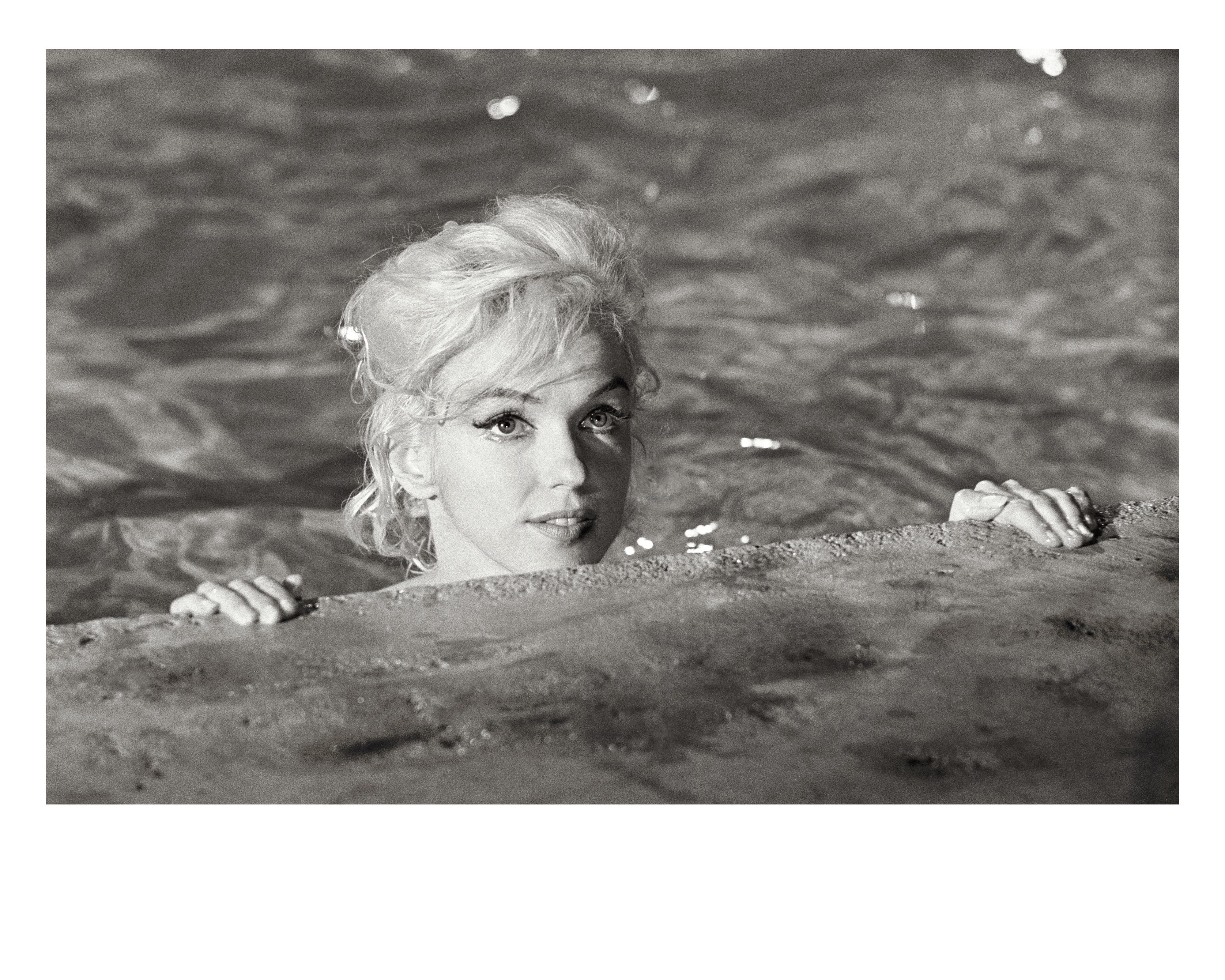 Lawrence Schiller Black and White Photograph - Marilyn Monroe close up in pool (black and white), 1962