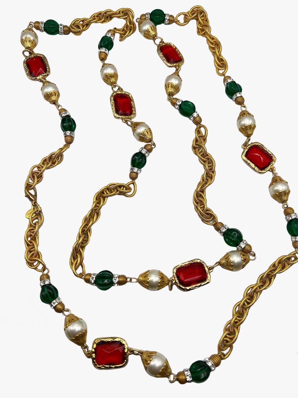 Lawrence VRBA stunning  vintage gold plated necklace with ruby and emerald colored inserts, faux pearl beads and rhinestones

Marked

Length – 137 cm / 54”, can be wound in two or three tiers

Condition – very good

........Additional information