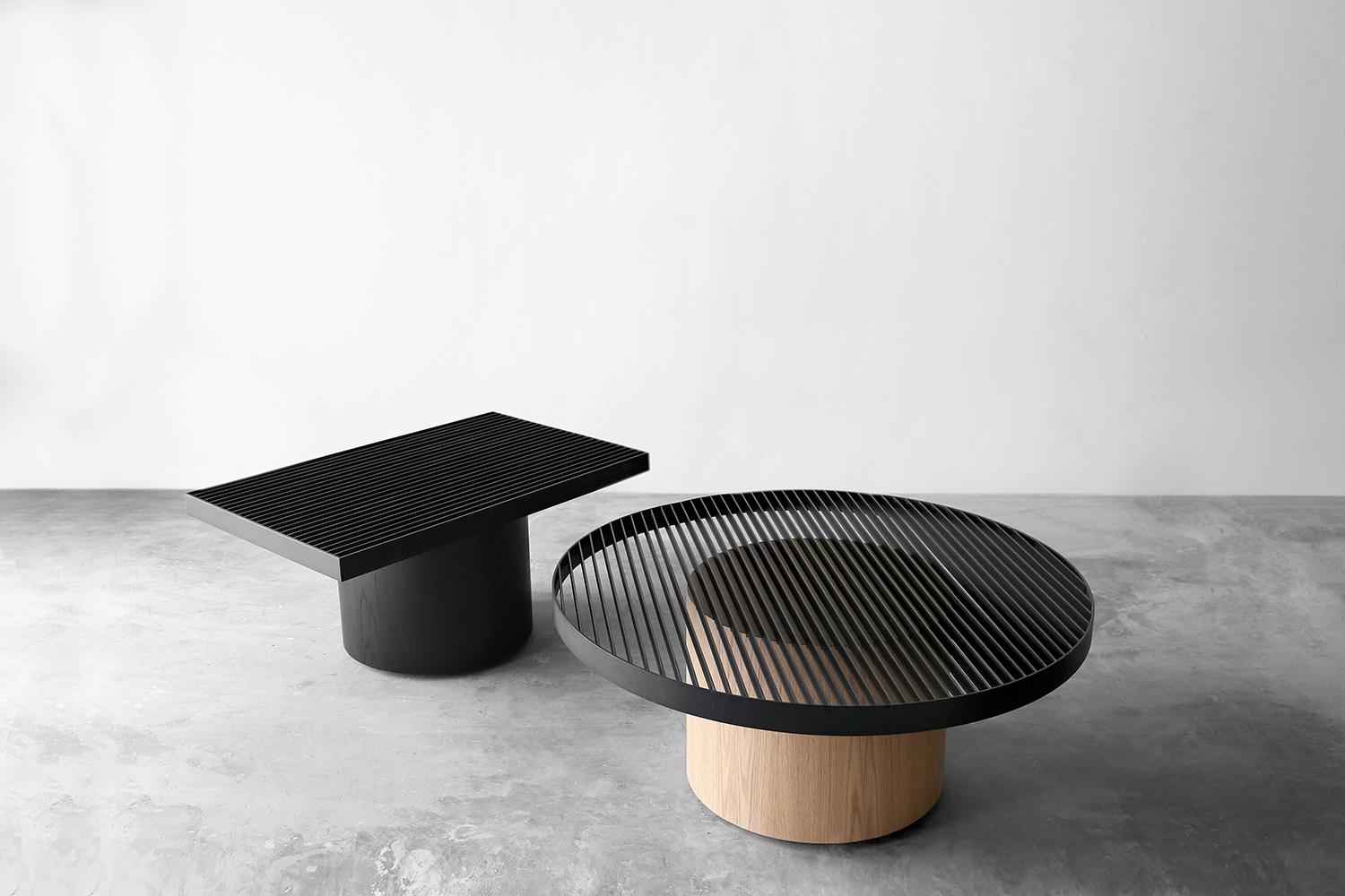 Laws of Motion Round Coffee Table in Oak and Metal Finish by Joel Escalona
 
Laws of Motion is a furniture collection that through a series of different typologies explores concepts like force, gravity and movement. Each of these functional