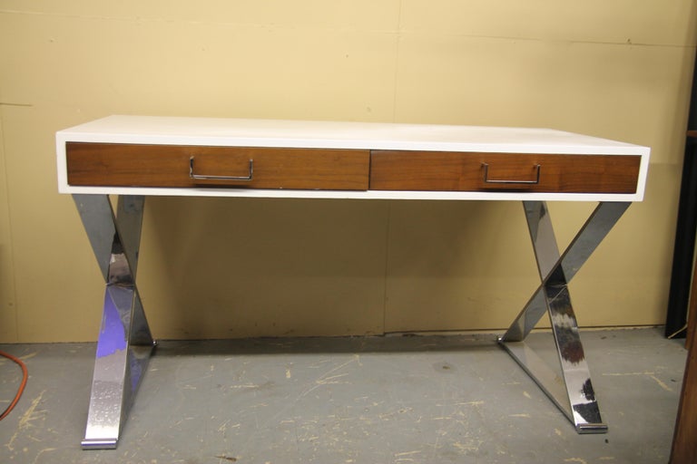 Lawson-Fenning desk/console table. You don't see this example often come to market. Great contrast between the white frames. Walnut front draws and chrome X-base legs.