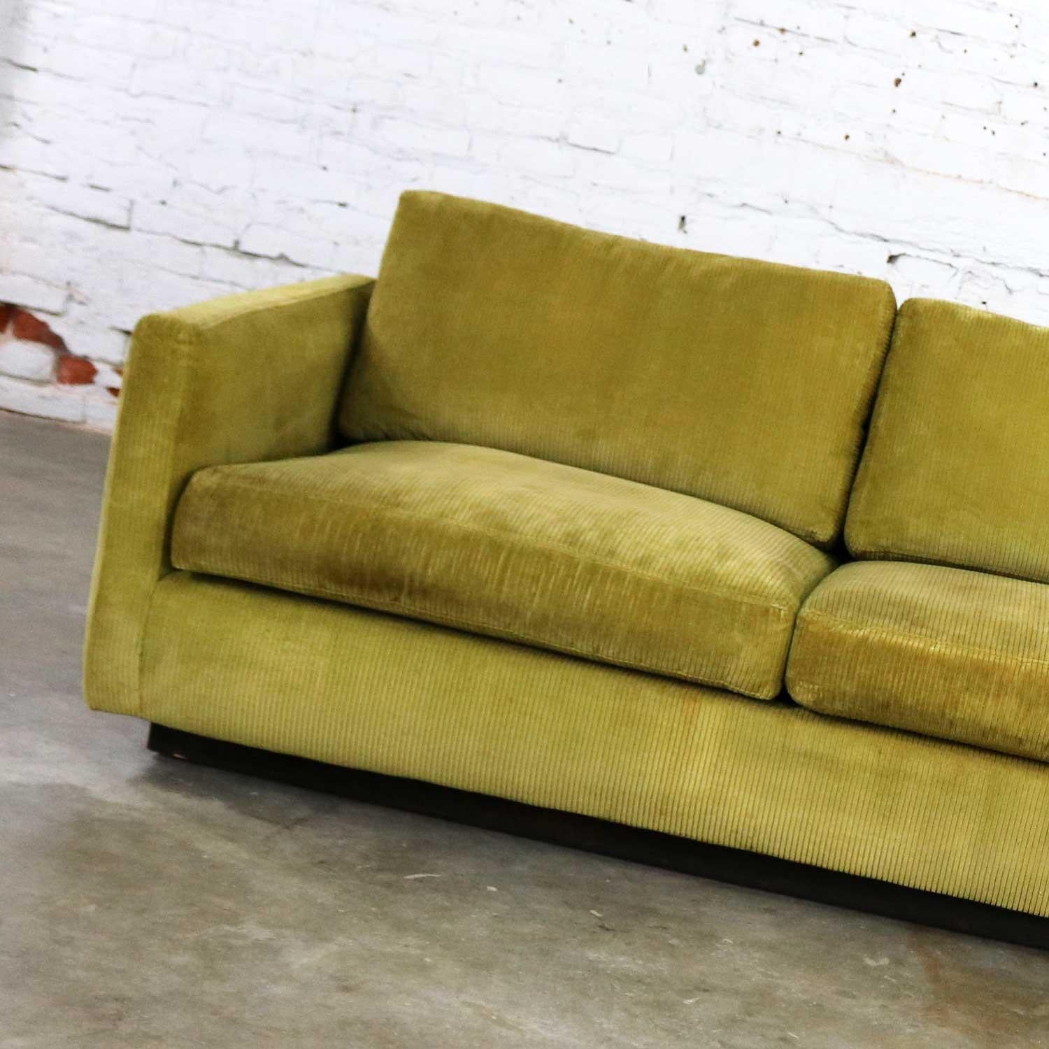 Handsome Lawson style sofa in its original olive colored wide wale corduroy fabric by Milo Baughman for Thayer Coggin. This sofa is unmarked, but we do have the original sales invoice from when it was purchased in 1966. It is in wonderful original
