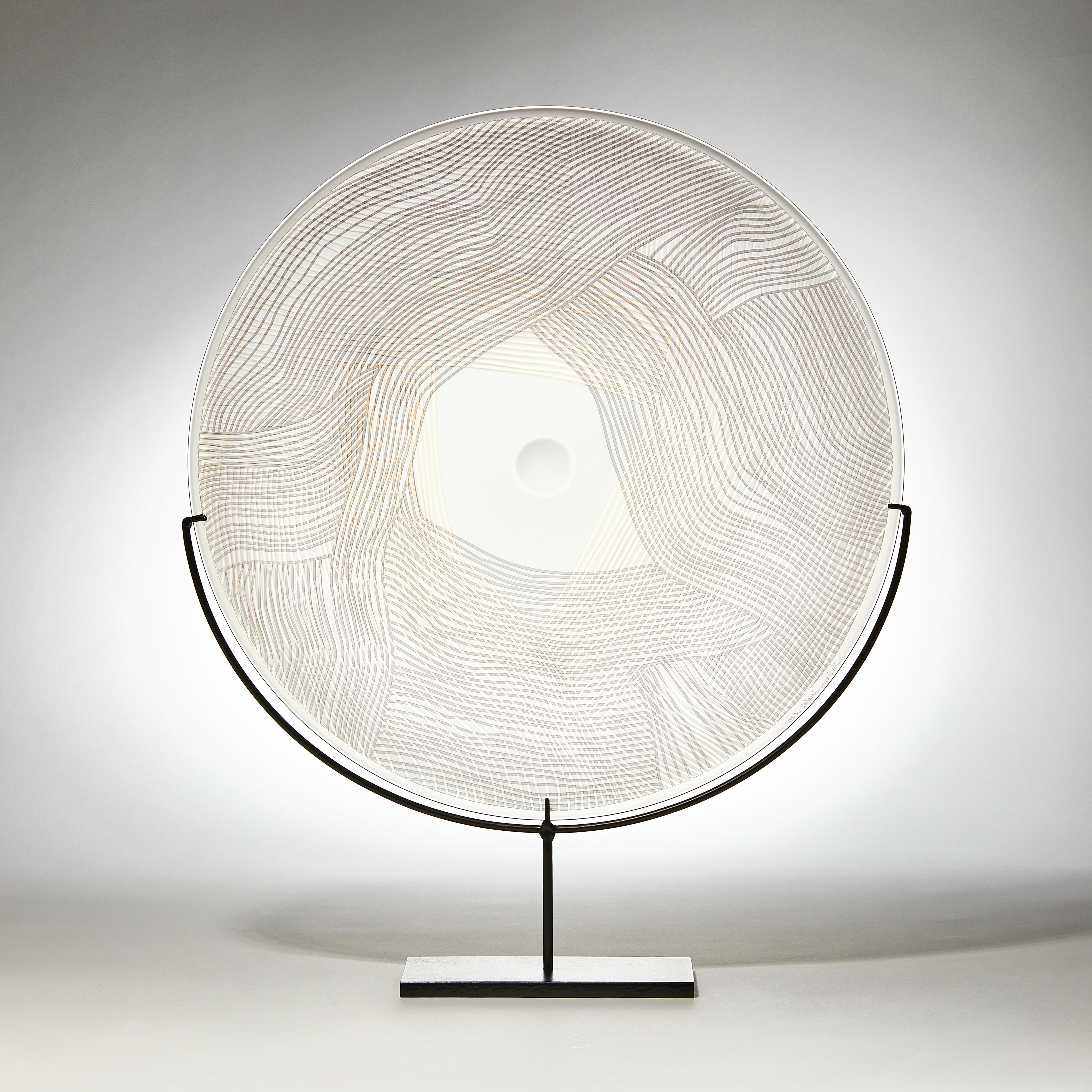 Layer on Layer is a unique gold, grey and clear hand blown and etched glass sculptural plate by the British artist Kate Jones, with a painted steel base.

Created with Stephen Gillies, with whom Jones makes many works in collaboration, these