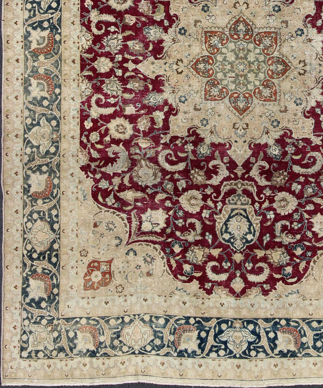 Antique Persian Mashad Rug, rug DSP-MKN380KS, country of origin / type: Iran / Mashad, circa Early-20th Century.

Measures: 9'9 x 12'6.

This highly decorative and elaborate antique Persian Mashad carpet features a layered, multi-tiered central