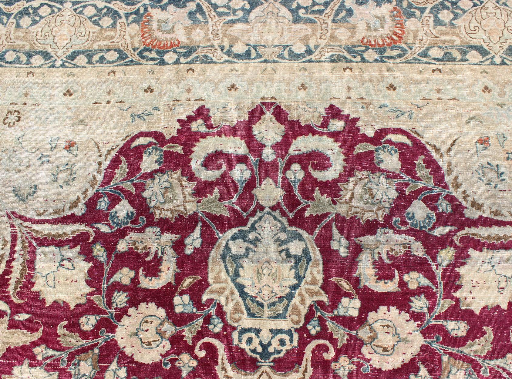 Layered Floral Medallion Antique Persian Mashad Rug in Red, Steel Blue and Cream In Excellent Condition For Sale In Atlanta, GA