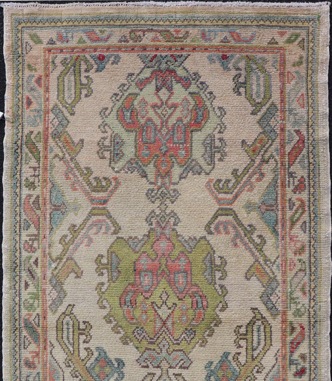 20th Century Layered Medallion Vintage Turkish Area Rug Oushak with Geometric Motifs For Sale