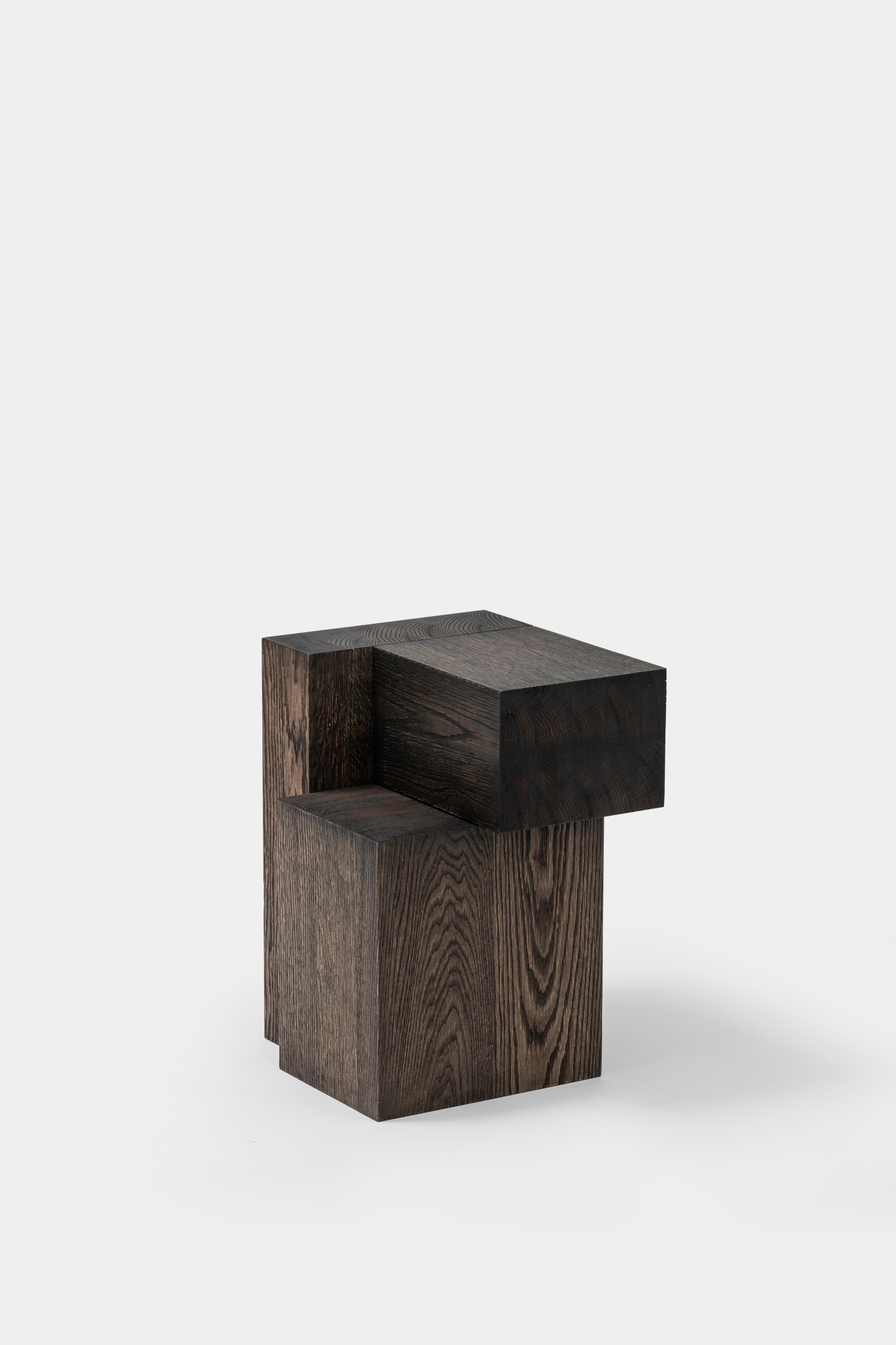 Layered oak wood stool by Hyungshin Hwang
Dimensions: D 33 x W 30 x H 42 cm
Materials: weathered oak

Layered Series is the main theme and concept of work of Hwang, who continues his experiment which is based on architectural composition of