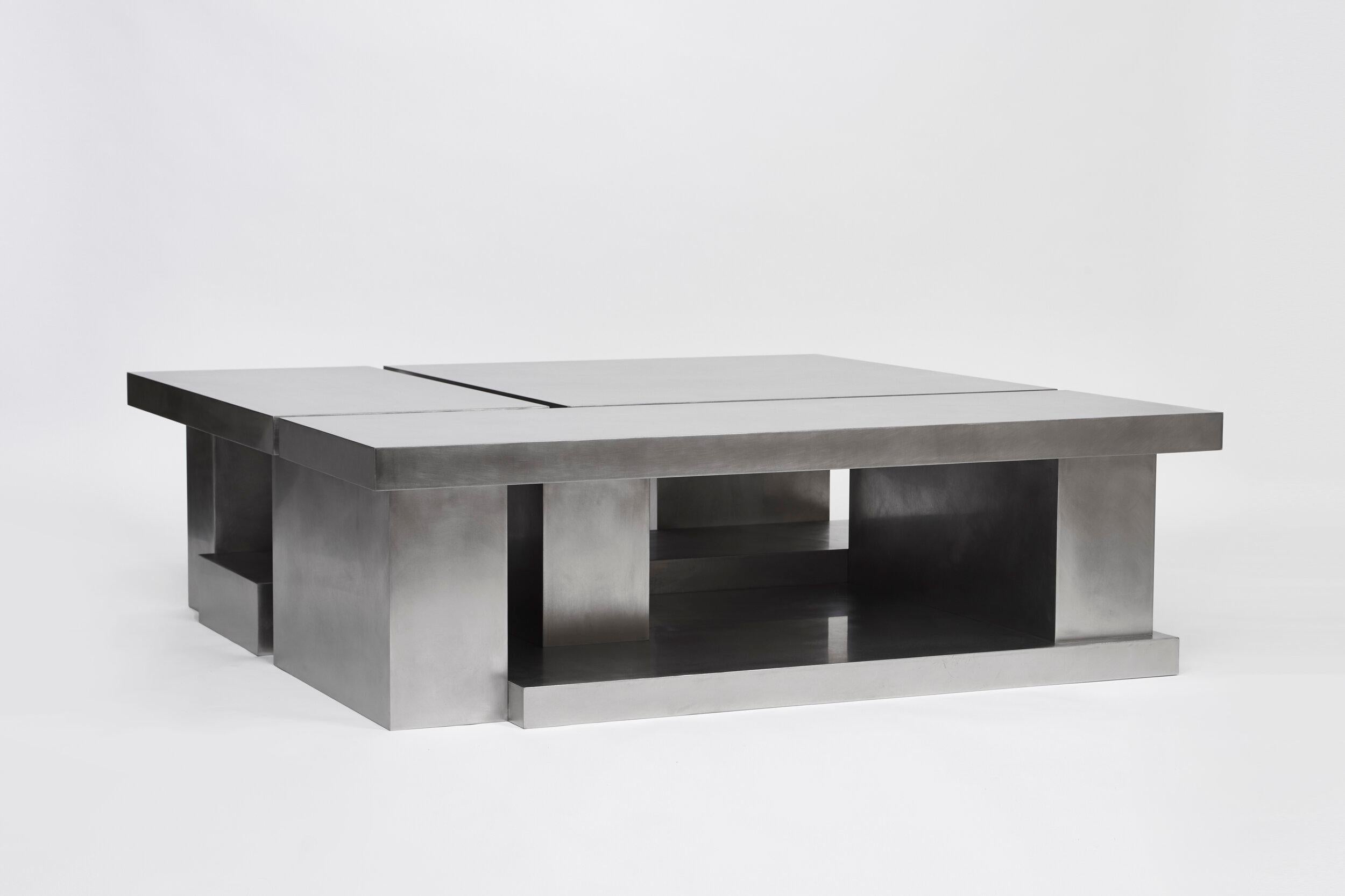 Layered steel coffee table I by Hyungshin Hwang
Dimensions: D 138 x W 138 x H 42 cm
Materials: stainless steel

Layered Series is the main theme and concept of work of Hwang, who continues his experiment which is based on architectural