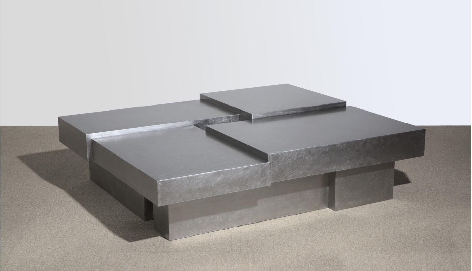 Layered steel coffee table II by Hyungshin Hwang
Dimensions: D 160 x W 120 x H 42 cm
Materials: stainless steel

Layered Series is the main theme and concept of work of Hwang, who continues his experiment which is based on architectural
