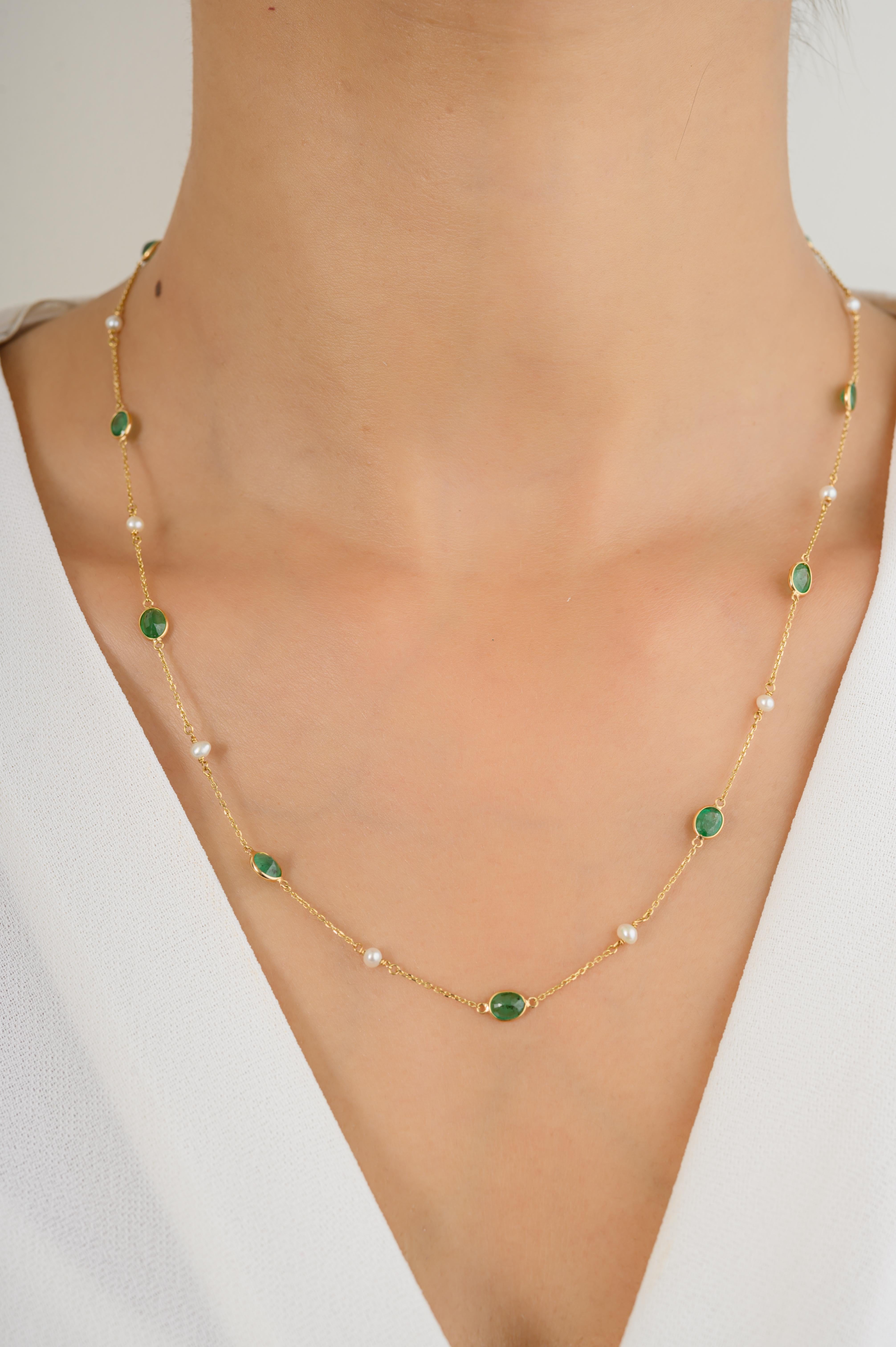 Layering Emerald Pearl Delicate Chain Necklace Gift for Mom in 18K Gold featuring natural emerald and pearl of 0.69 carats. The gorgeous handcrafted necklace goes with every style.
Pearl symbolizes purity, determination and perfection and Emerald