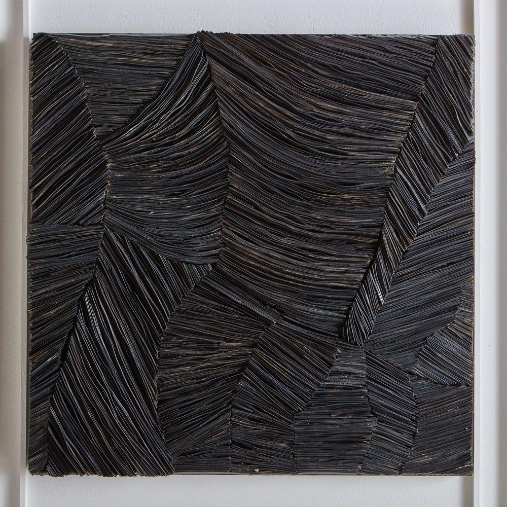 A textural wall sculpture made with cardboard on wood by Canadian artist Erin Vincent. Her work is inspired by the beauty and simplicity of nature and reflects organic formations such as water currents and rock formations.

Erin Vincent is a