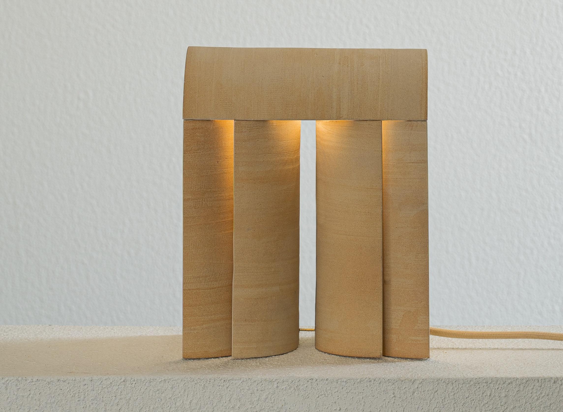 Layers of III lamp by Evelina Kudabaite 
Materials: Stoneware
Dimensions: D 12 x W 20 x H 24 cm.
One of a kind.
Small and large sizes available. 
All our lamps can be wired according to each country. If sold to the USA it will be wired for the