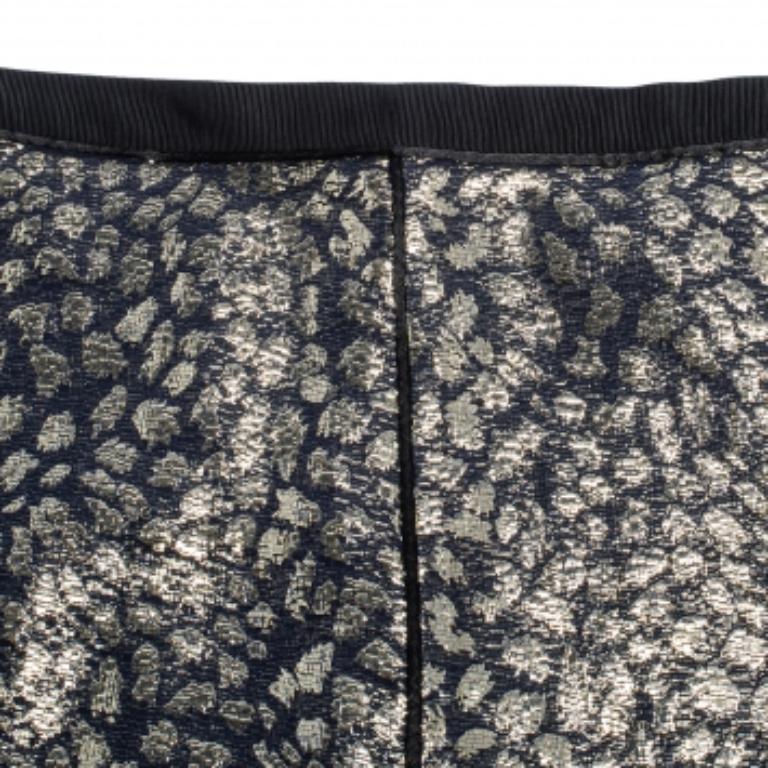 Work LAYEUR’s statement silhouettes into your wardrobe like this metallic top and skirt set. It’s crafted from silk featuring a belted tunic top and a matching maxi skirt. Match your accessories to the print.