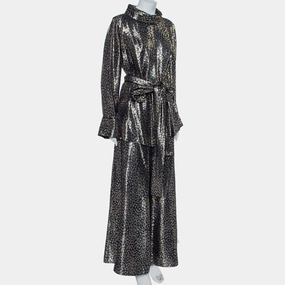 Work LAYEUR’s statement silhouettes into your wardrobe like this metallic top and skirt set. It’s crafted from silk featuring a belted tunic top and a matching maxi skirt. Match your accessories to the print.

Includes: Brand tag, Belt