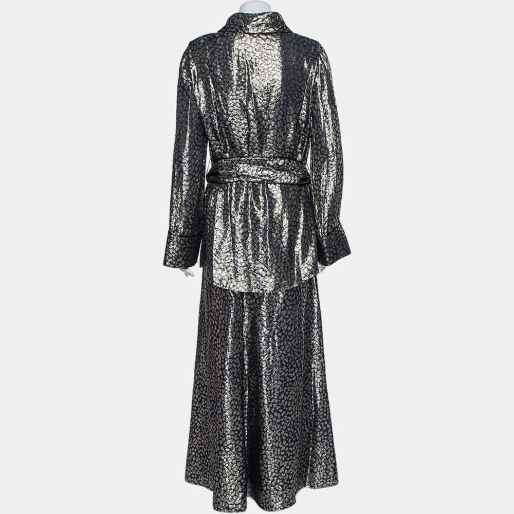 Work LAYEUR’s statement silhouettes into your wardrobe like this metallic top and skirt set. It’s crafted from silk featuring a belted tunic top and a matching maxi skirt. Match your accessories to the print.

Includes: Brand tag, Belt