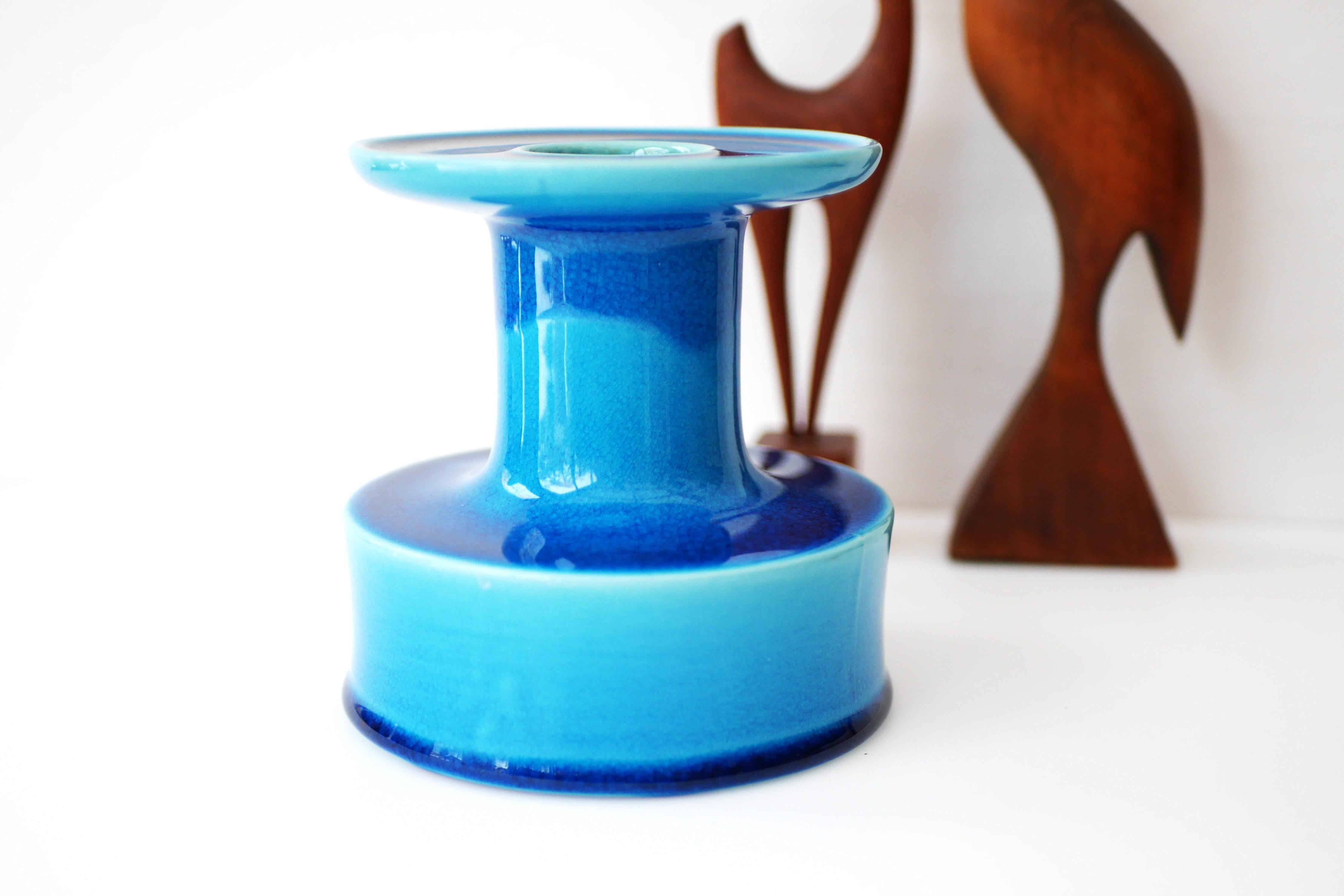 From the 'Lazur' series by Stig Lindberg for Gustavsberg. The bright blue glaze makes this piece really stand out and can be used both as a candlestick or a vase.

The history of Gustavsberg dates back to 1825. In 1826, the wholesaler Herman Öhman