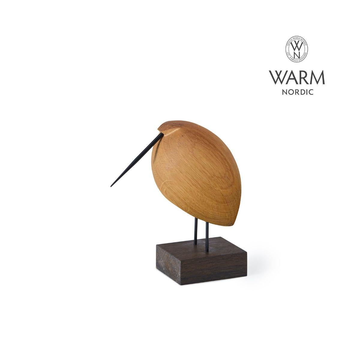 Charming oak birds with beaks and great personality. Manufactured in Denmark and designed by the internationally renowned designer, Svend Aage Holm-Sørensen, who was particularly famous for his lamp designs in the 1950s. Beak Birds brings a smile to