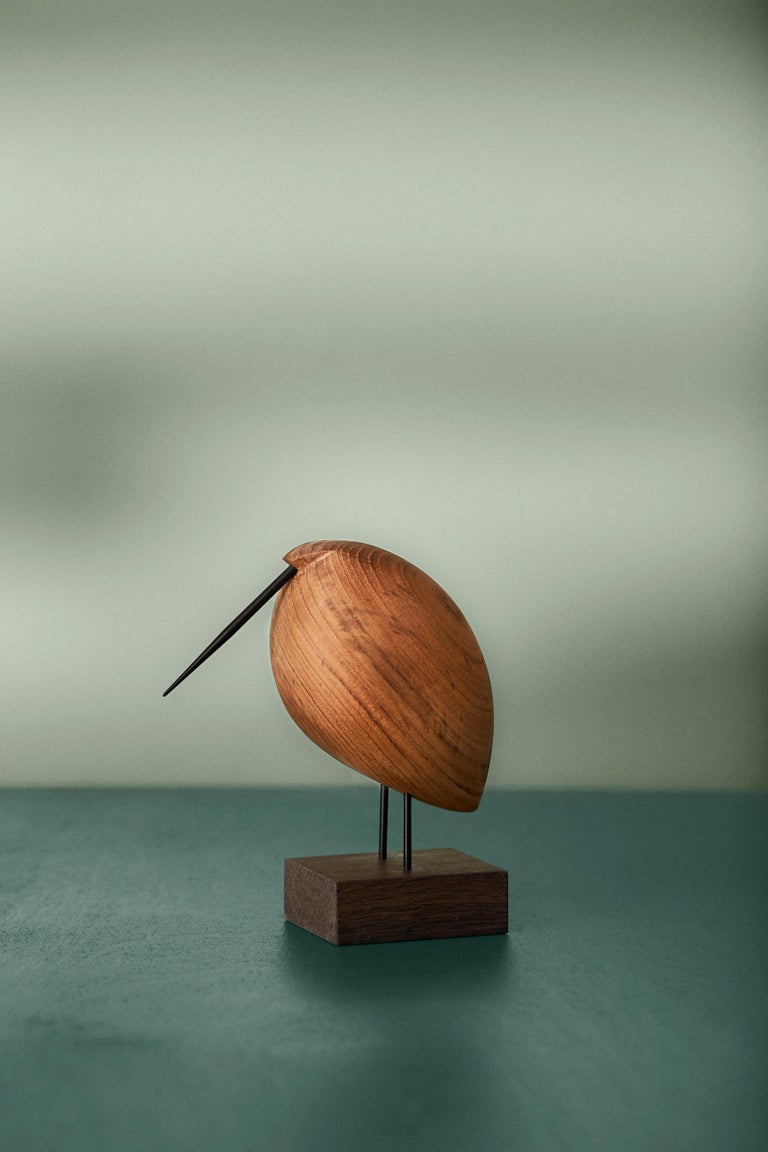 Charming teak birds with beaks and great personality. Manufactured in Denmark and designed by the internationally renowned designer, Svend Aage Holm-Sørensen, who was particularly famous for his lamp designs in the 1950s. Beak Birds brings a smile