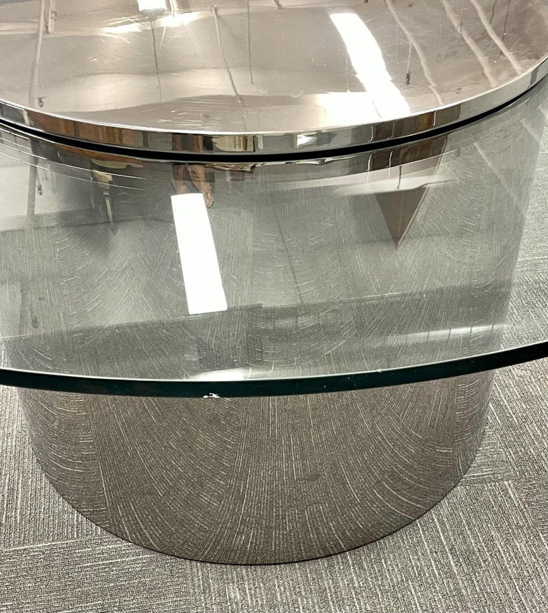 Lazy Susan Glass Top Chrome Base Dining Table manner Jacques Charles. Part of our extensive collection of over forty dining tables and chair sets as seen on this site, thus why we are referred to as the King of Dining rooms.
 
This simply stunning