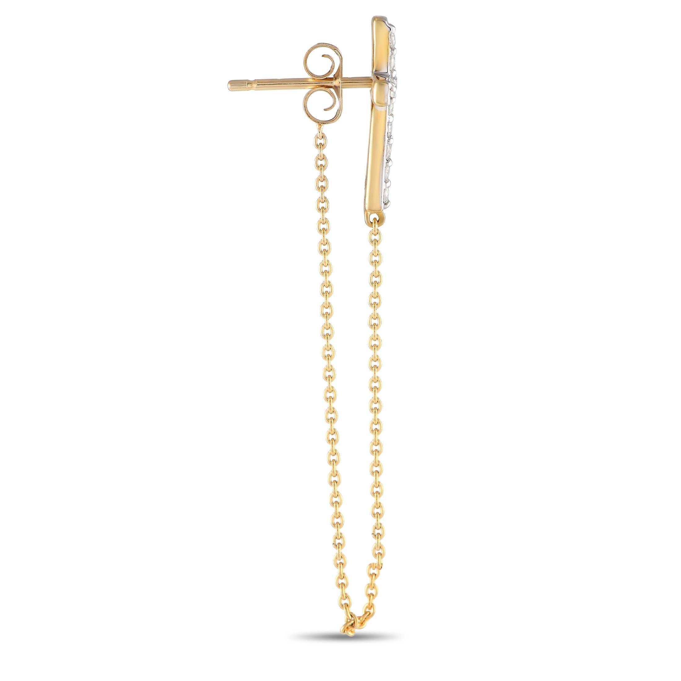 A dramatic drop chain accents elevates these impeccable crafted 10K Yellow Gold earrings. At the base, a cross motif comes to life thanks to sparkling Diamonds with a total weight of 0.25 carats. Each one measures 1.65 long, 0.35 wide, and comes