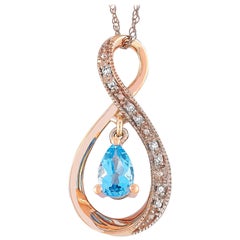LB Exclusive 14 Karat Gold 0.03 Carat Diamond and Blue Topaz Pendant Necklace