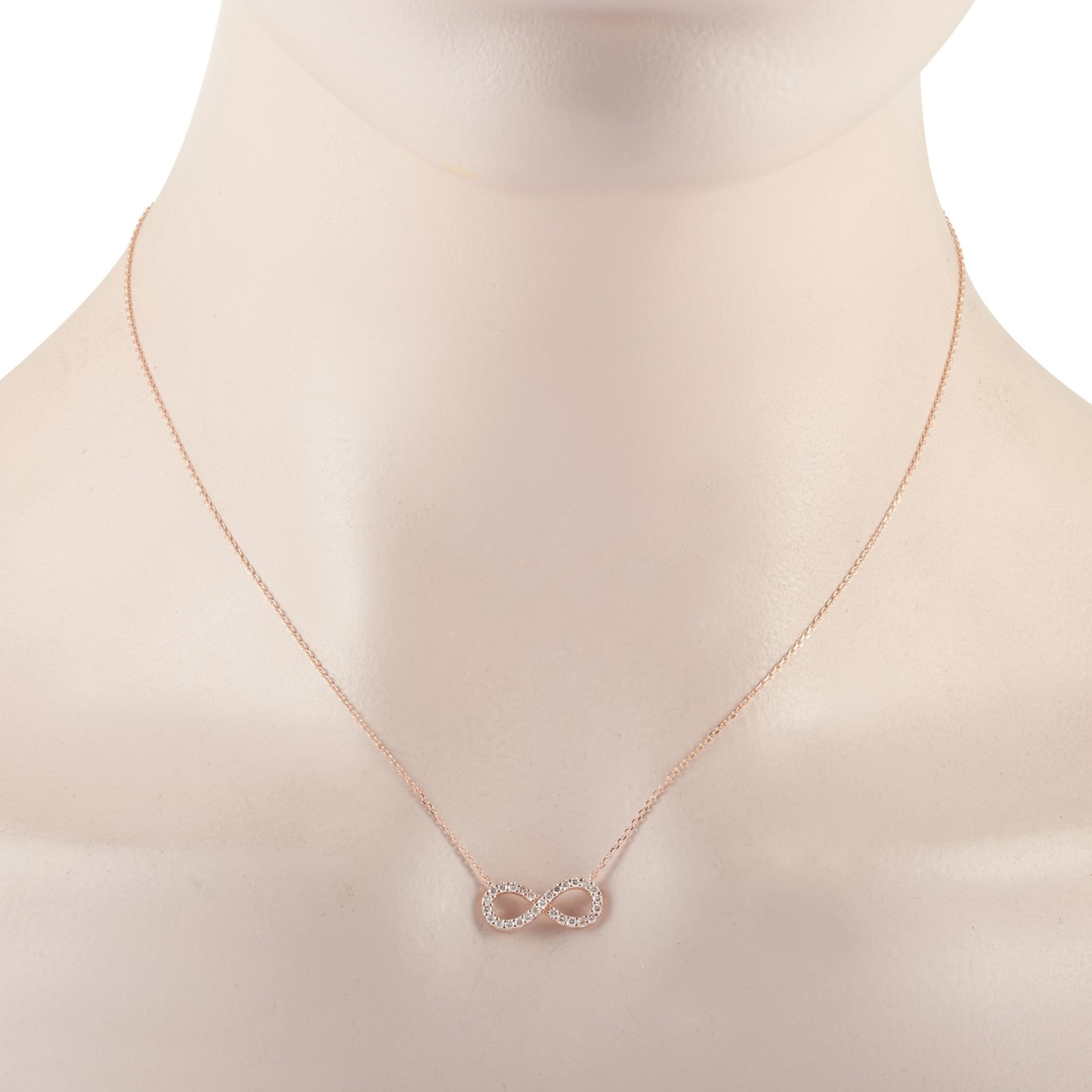 This LB Exclusive necklace is made of 14K rose gold and embellished with diamonds that amount to 0.30 carats. The necklace weighs 2 grams and boasts a 15” chain and an infinity symbol pendant that measures 0.25” in length and 0.63” in width.
 
