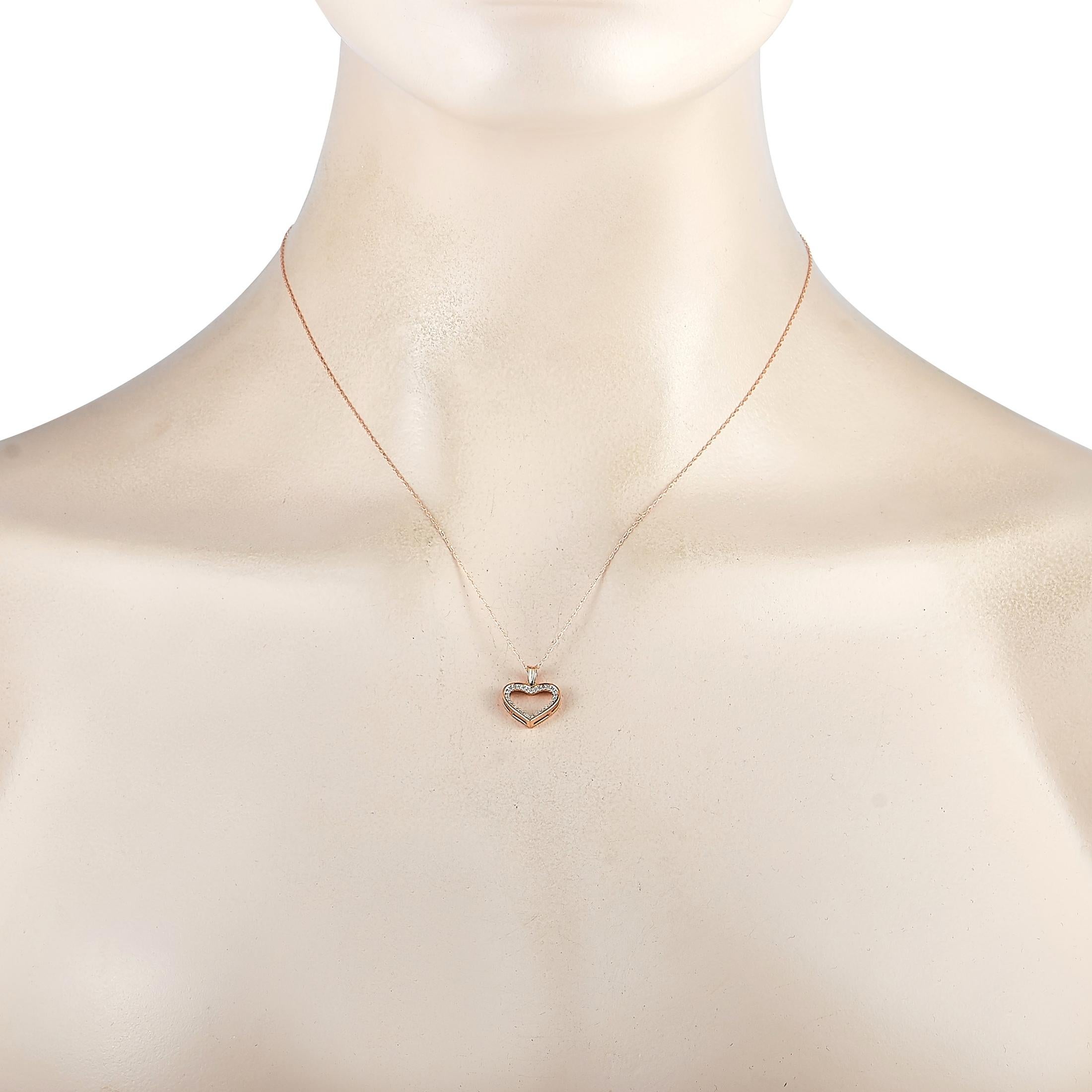 This LB Exclusive necklace is crafted from 14K rose gold and weighs 1.2 grams. It is presented with a 17” chain and a heart pendant that measures 0.62” in length and 0.50” in width. The necklace is embellished with diamonds that total 0.10 carats.
